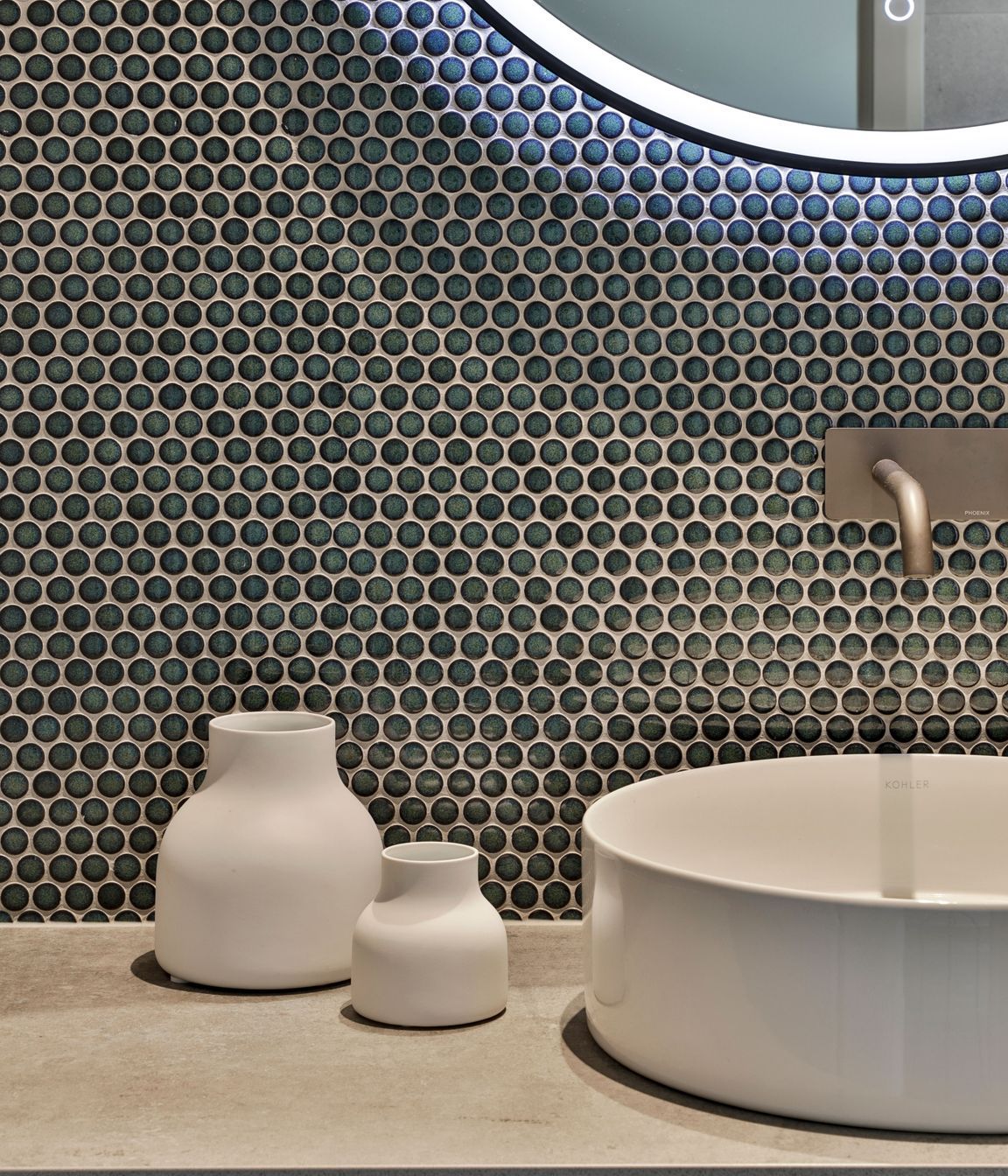 Design by Cube Dentro. Tiles: Mosaix Penny Round Jade.
