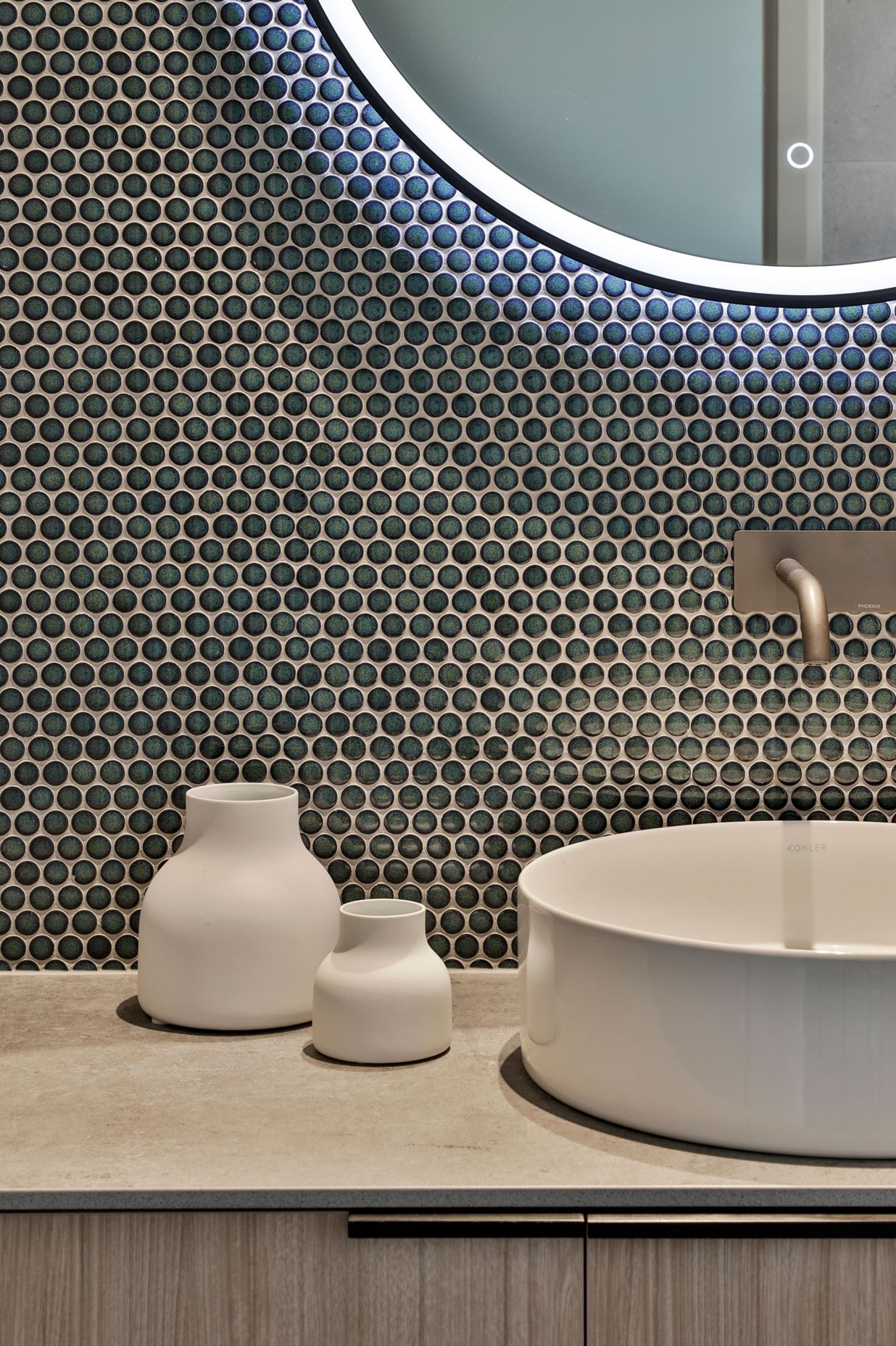 Design by Cube Dentro. Tiles: Mosaix Penny Round Jade.