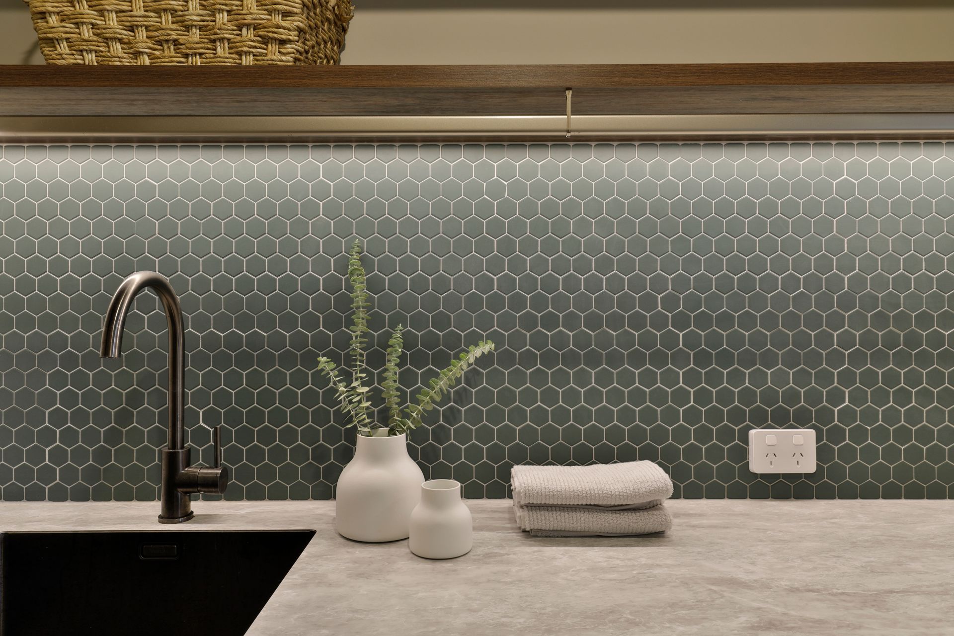 Design by Cube Dentro. Laundry splashback Beton Green Echo Hex Mosaic 316x316mm