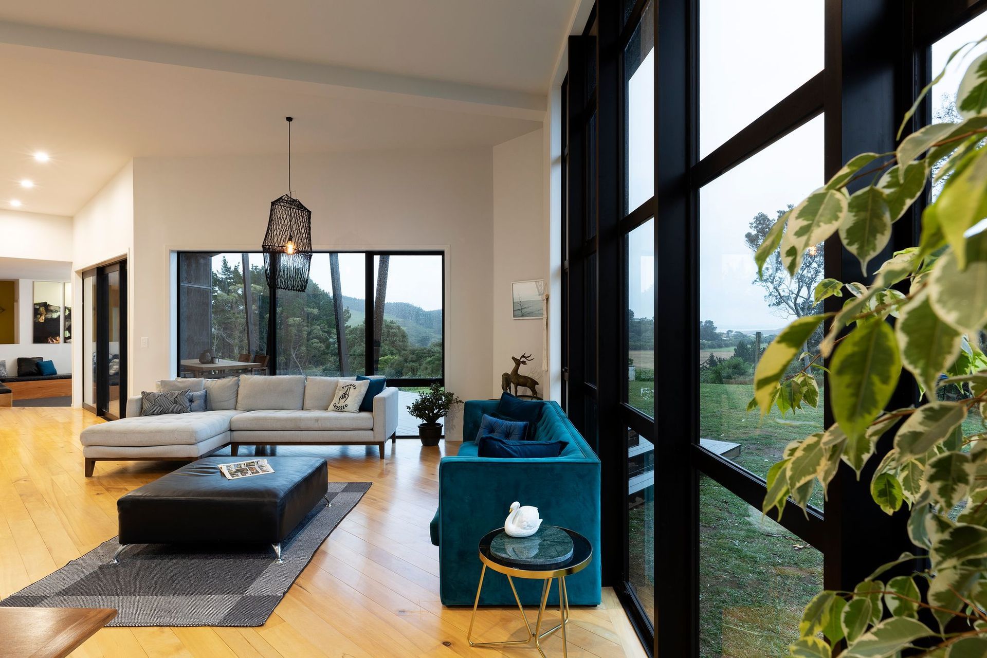 Internally, the layout has been kept intentionally informal with spaces flowing into each other and window forms being used to frame the immediate surroundings.