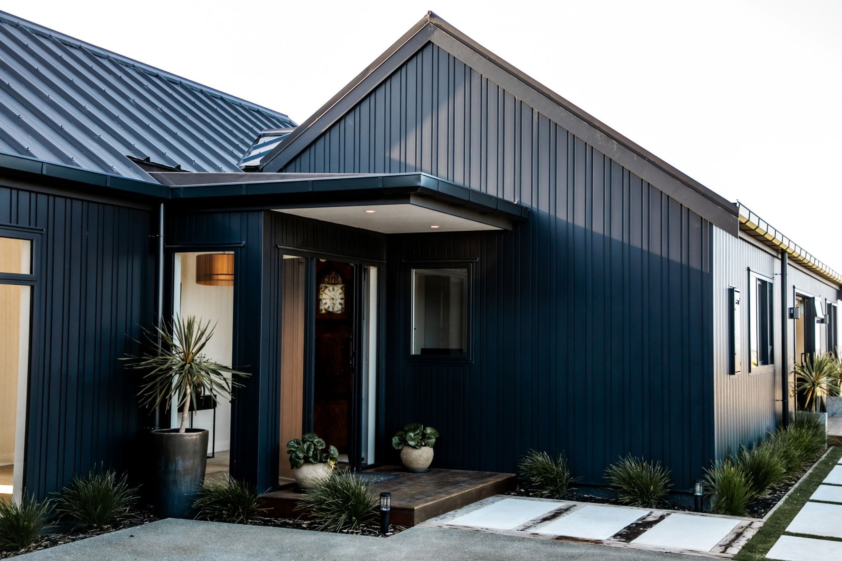 black-nuwall-cladding-te-arai-farmhouse-arcline-architecture-3.jpg