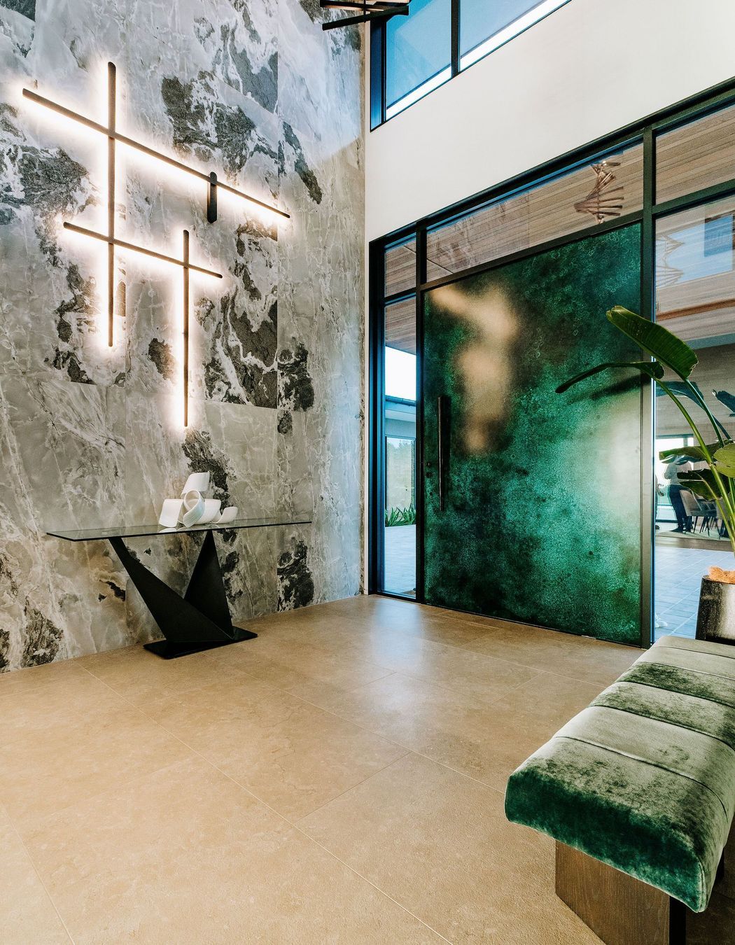 entry-tiled-feature-wall-seat-table-steel-pivot-door-green-whites-lighting-feature-arcline.jpg