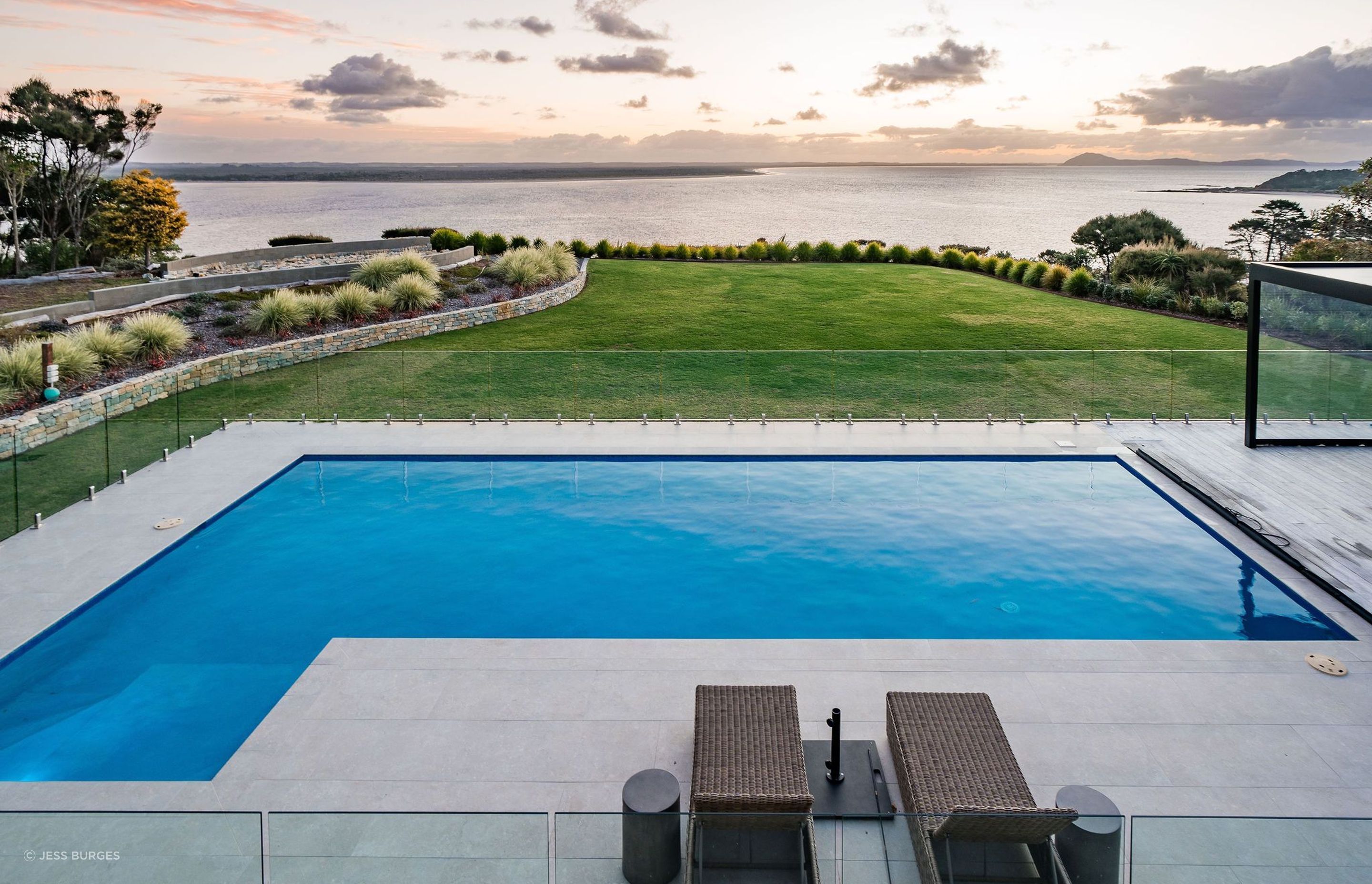 pool-sea-views-arcline-architecture-tiles-balustrade-lawn-water.jpg