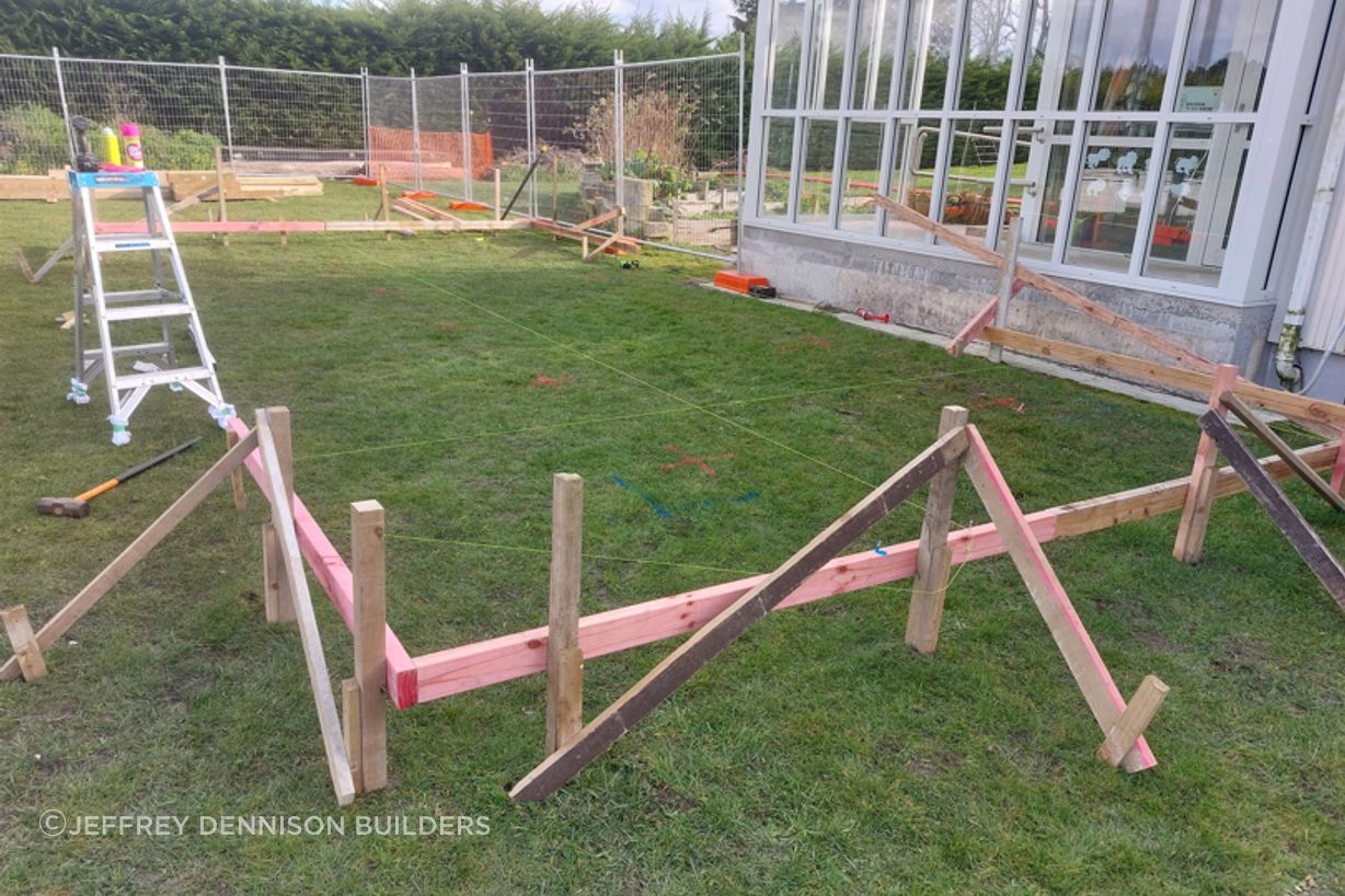 2-Totara-Primary-School-Oamaru-Batter-boards-on-piles-lifted-to-height-required-with-strings-lines-marking-out-where-piles-needed-JDBuilders.jpg