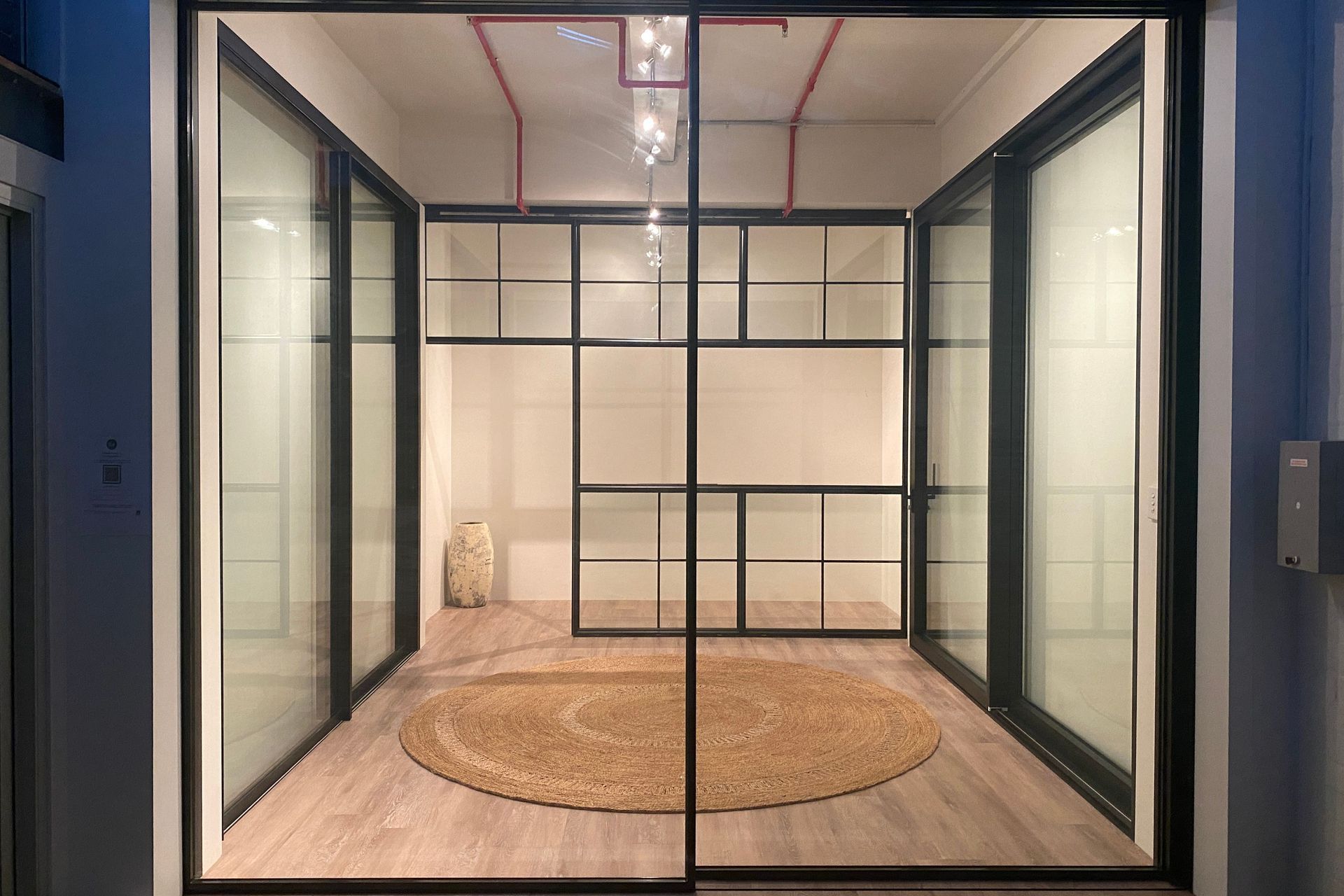 Minimal sliding door with concealed frames