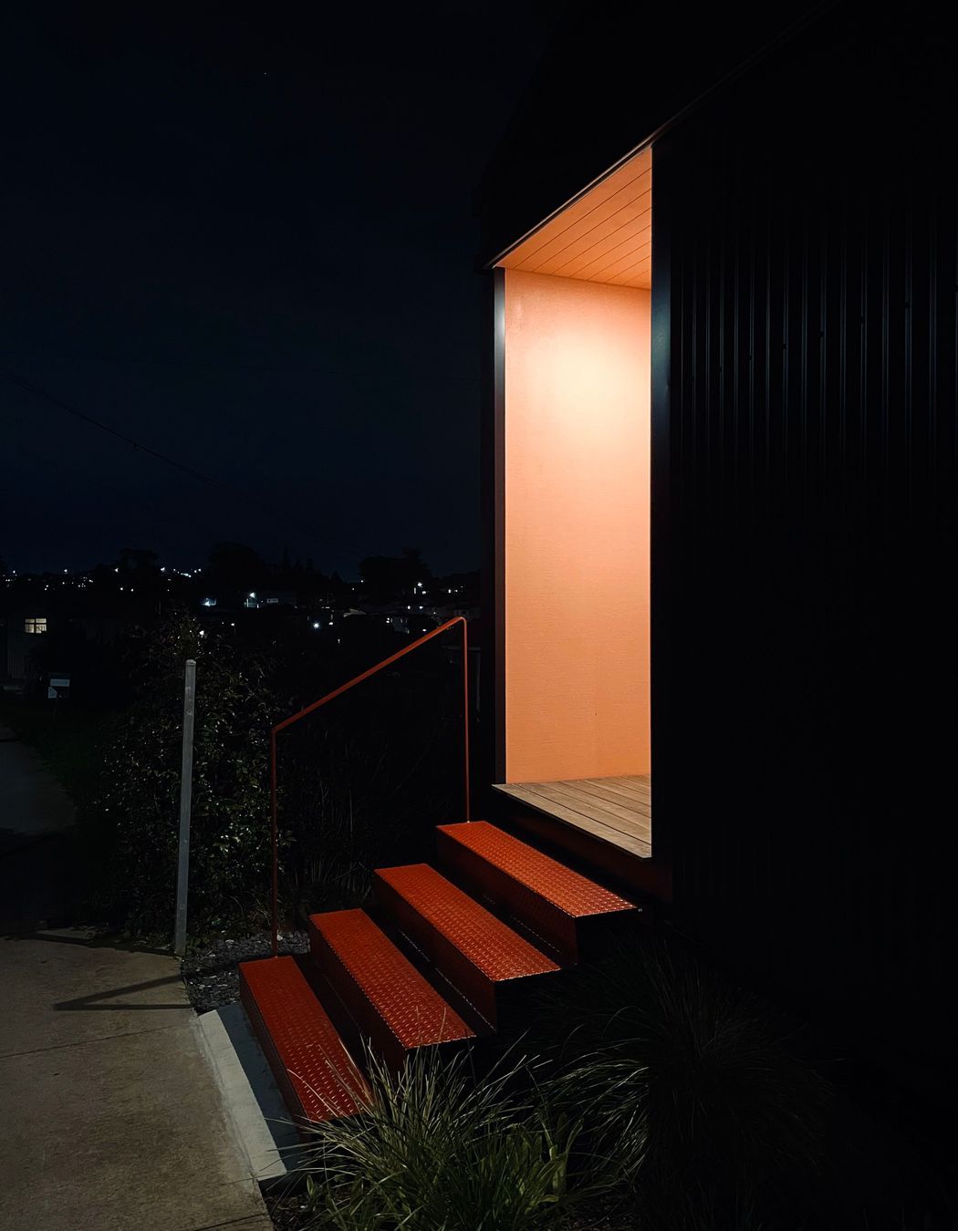 02-Pink-porch-glowing-at-night-time.jpg