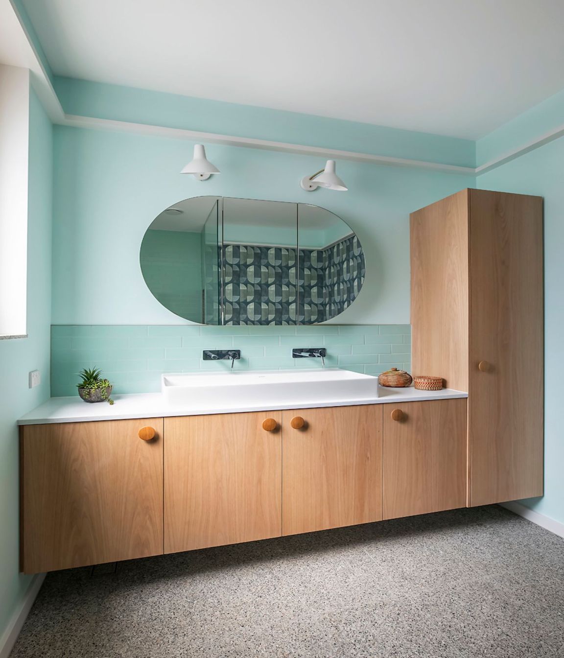 08-portrait-envirotecture-curvaceous-passivhaus-nsw-blue-bathroom.jpg