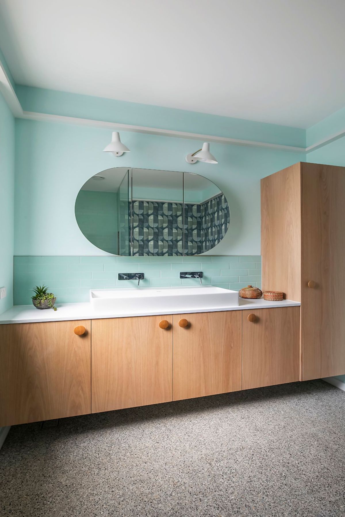 08-portrait-envirotecture-curvaceous-passivhaus-nsw-blue-bathroom.jpg