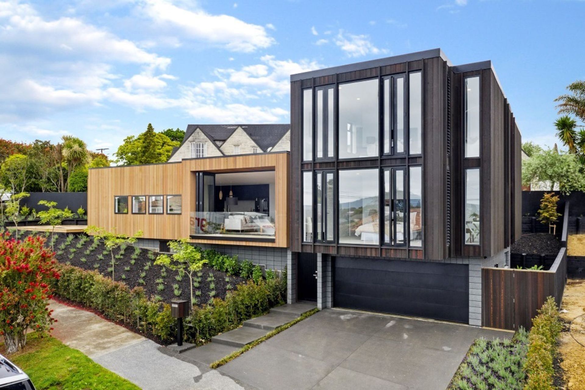 Located in one of Auckland’s more sought after streets, this family home features four bedrooms, four bathrooms, open plan living and front, rear and side decks to take advantage of the view.