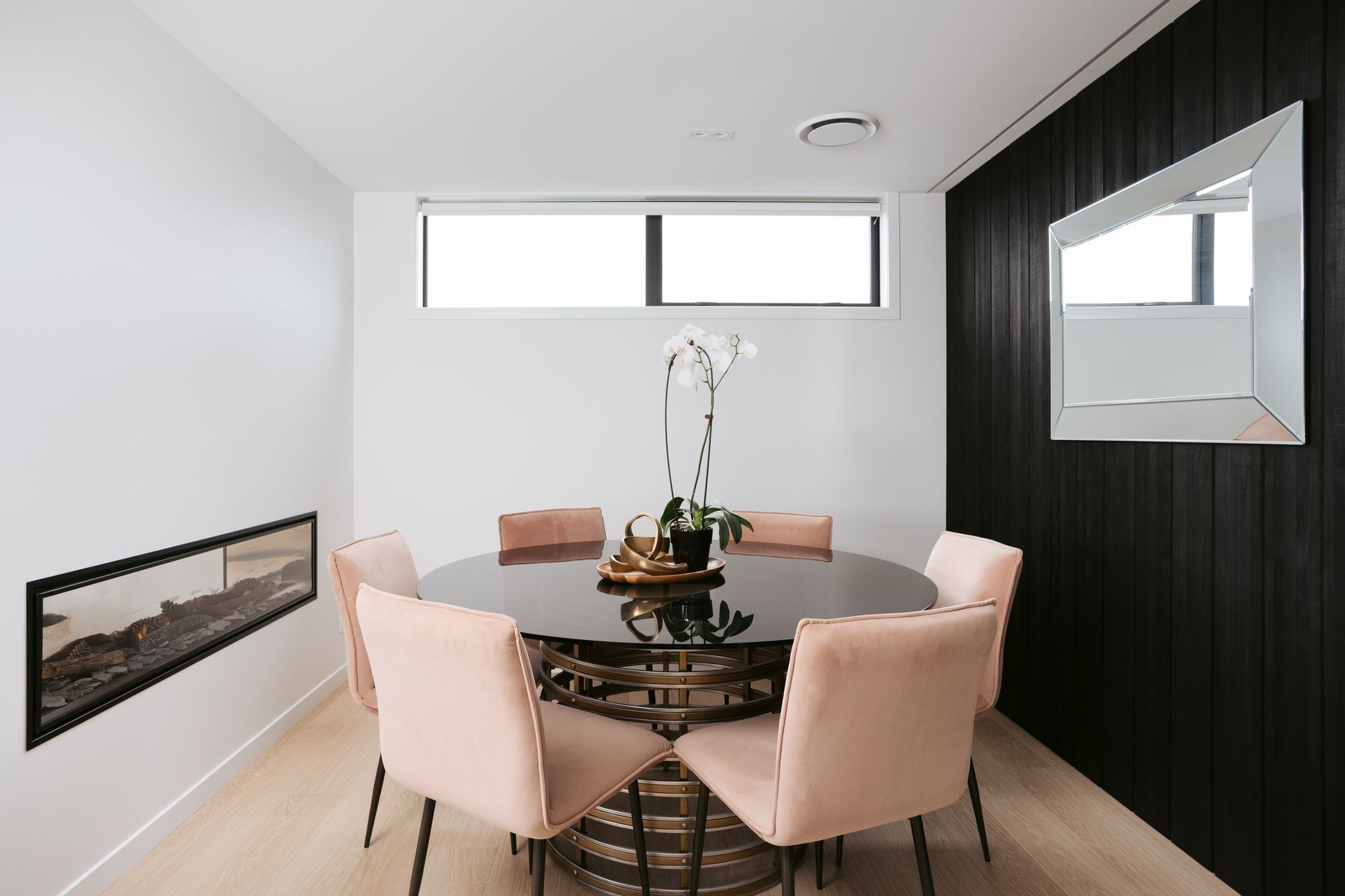 An Abodo feature wall adds texture to the dining space.