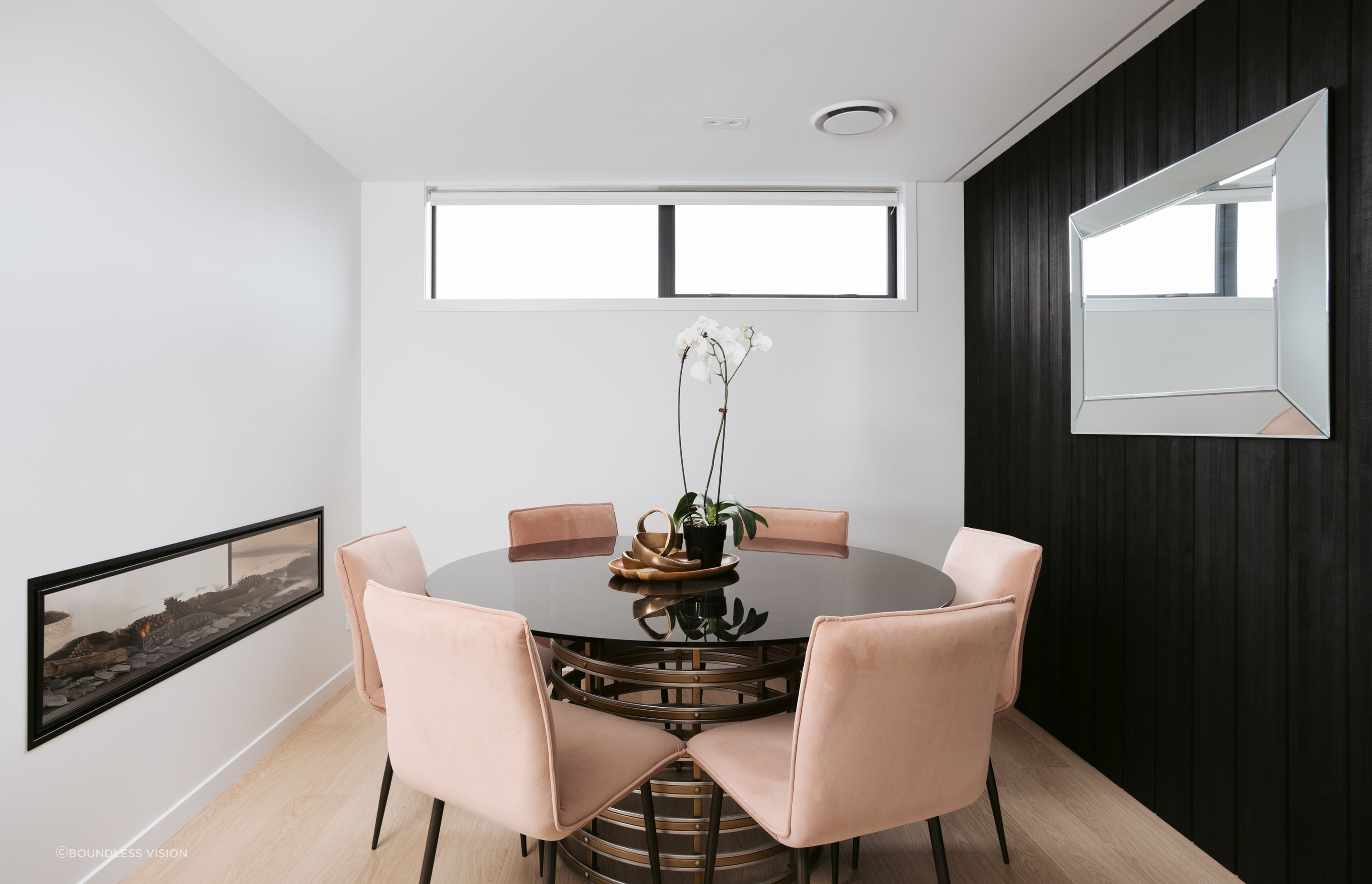 An Abodo feature wall adds texture to the dining space.