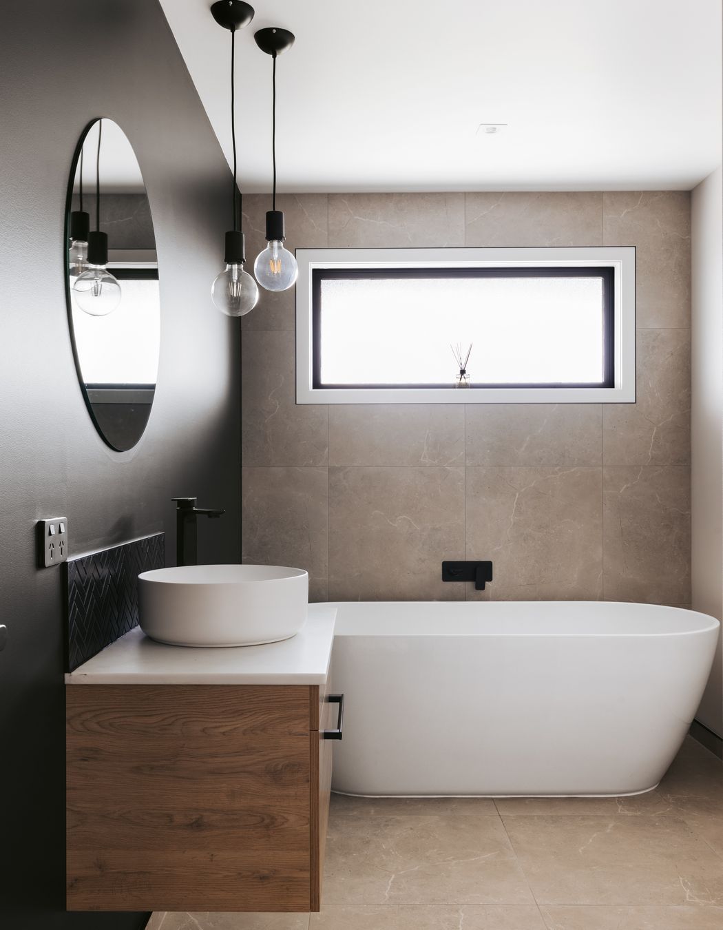 A freestanding bathtub is perfect for the family bathroom.