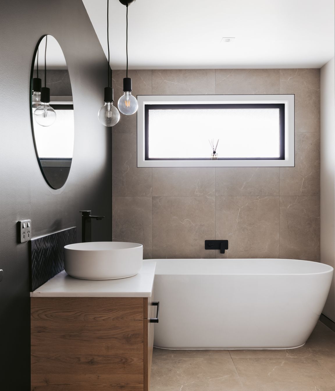 A freestanding bathtub is perfect for the family bathroom.