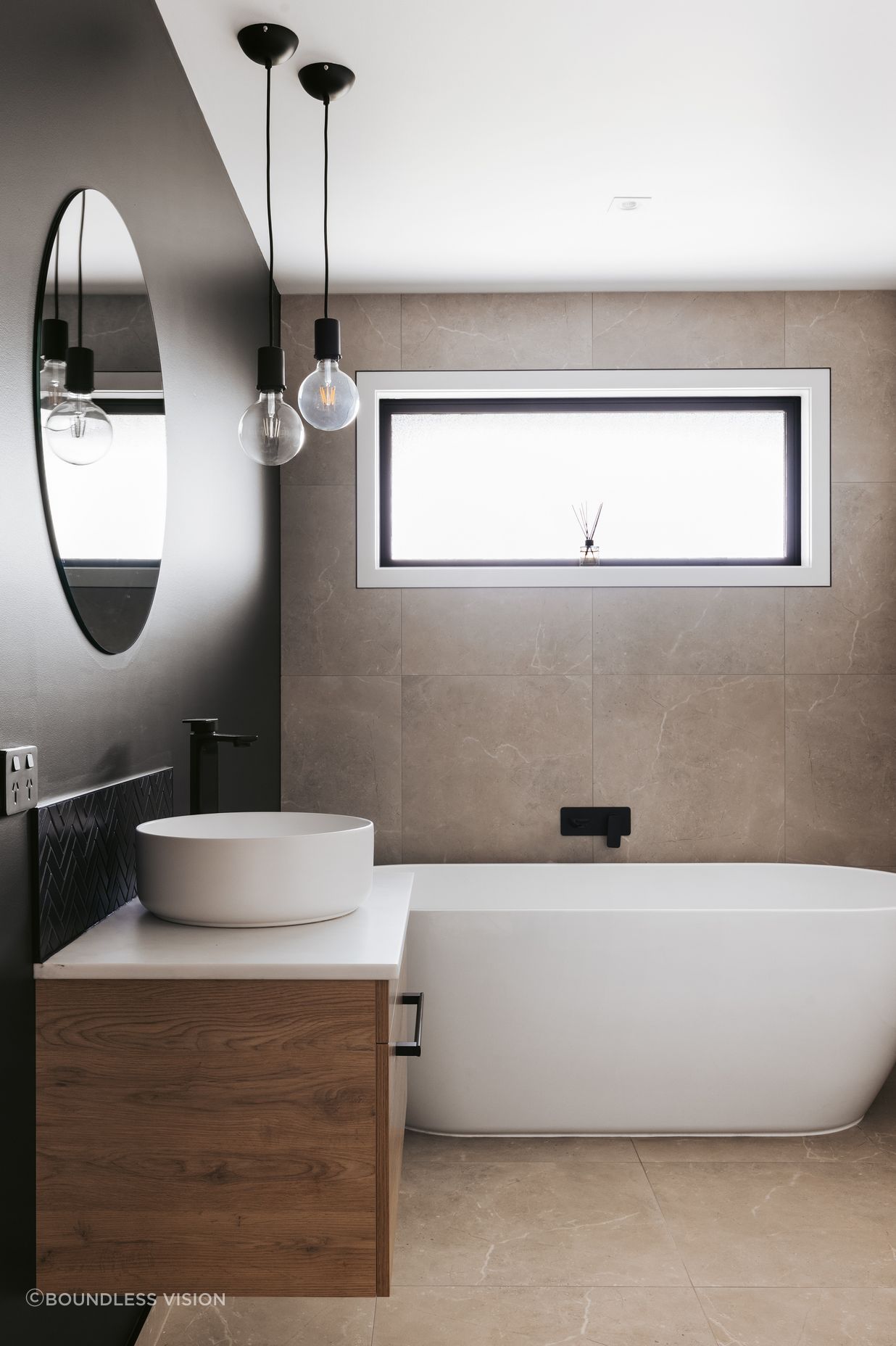 A freestanding bathtub is perfect for the family bathroom.
