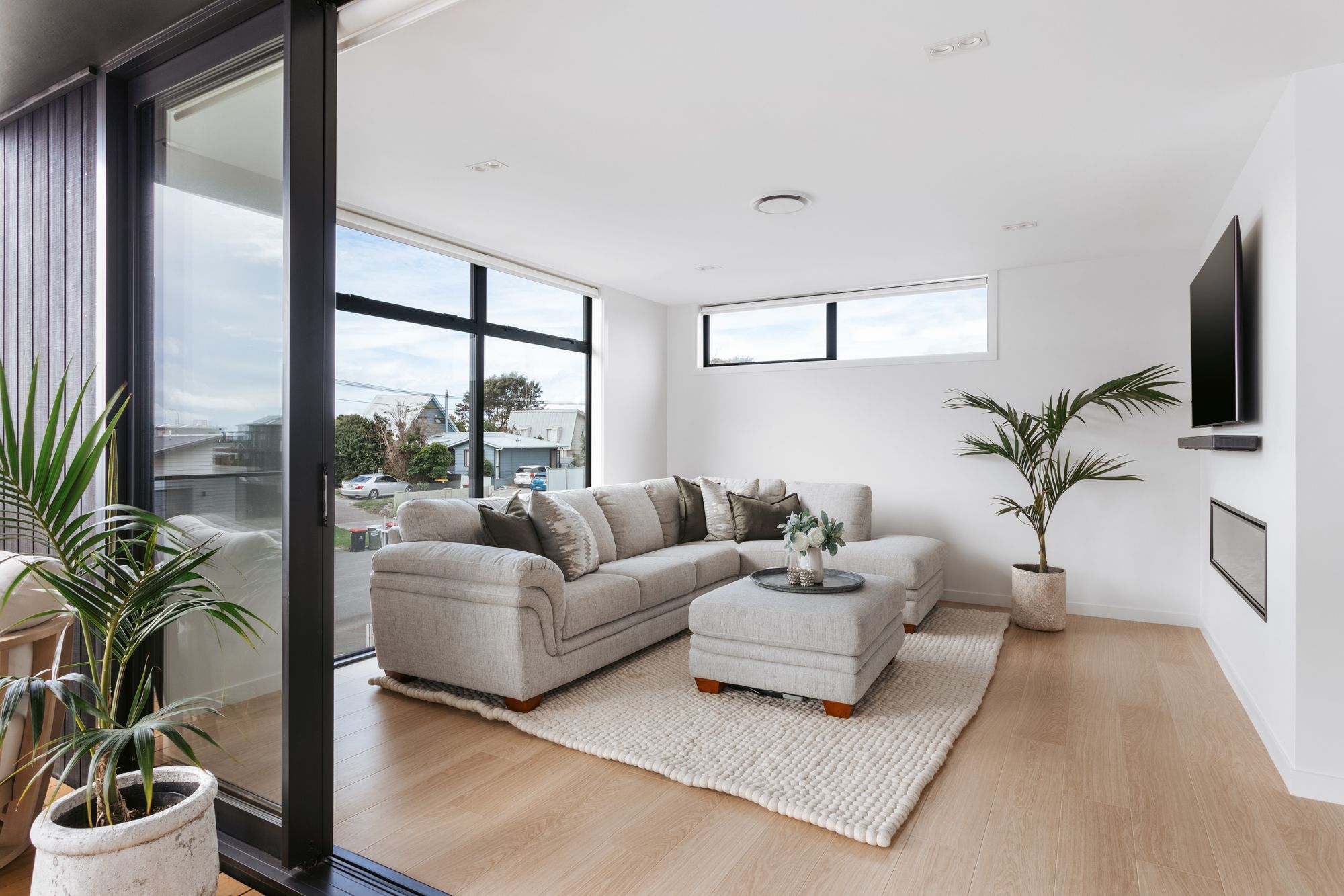 A clever floorpan enables the lounge area to be both private, and connected to the rest of the space.