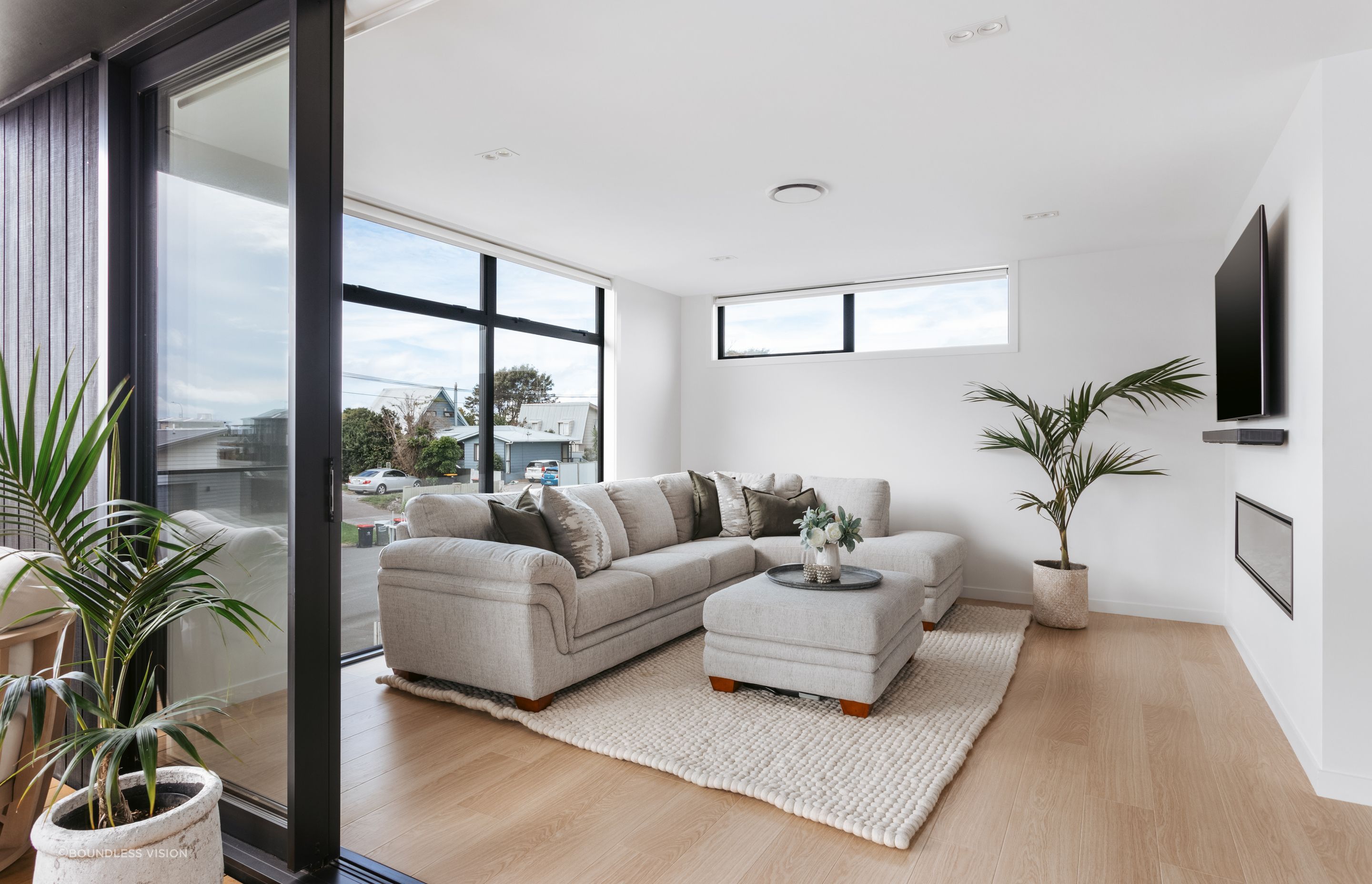 A clever floorpan enables the lounge area to be both private, and connected to the rest of the space.