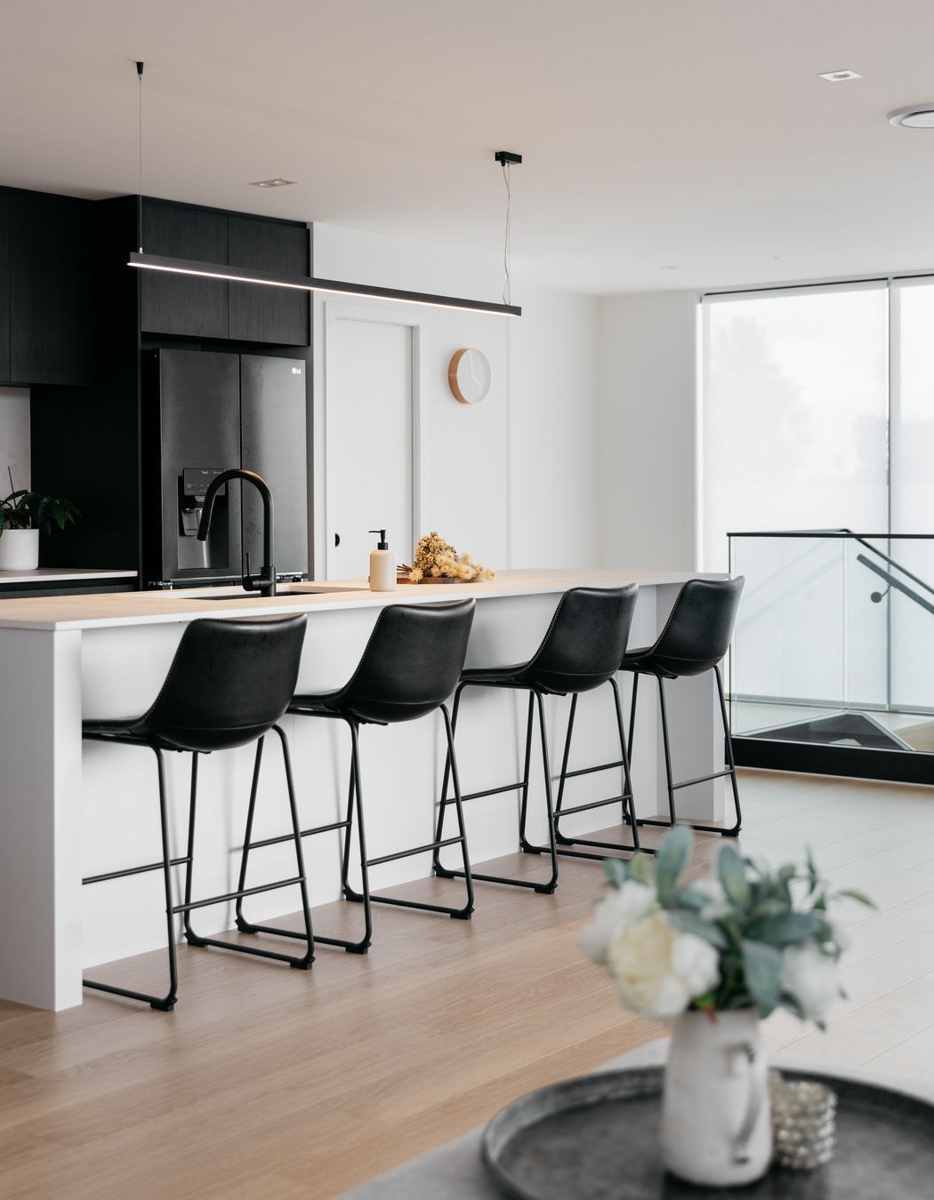 The large island bench provides room for additional seating.