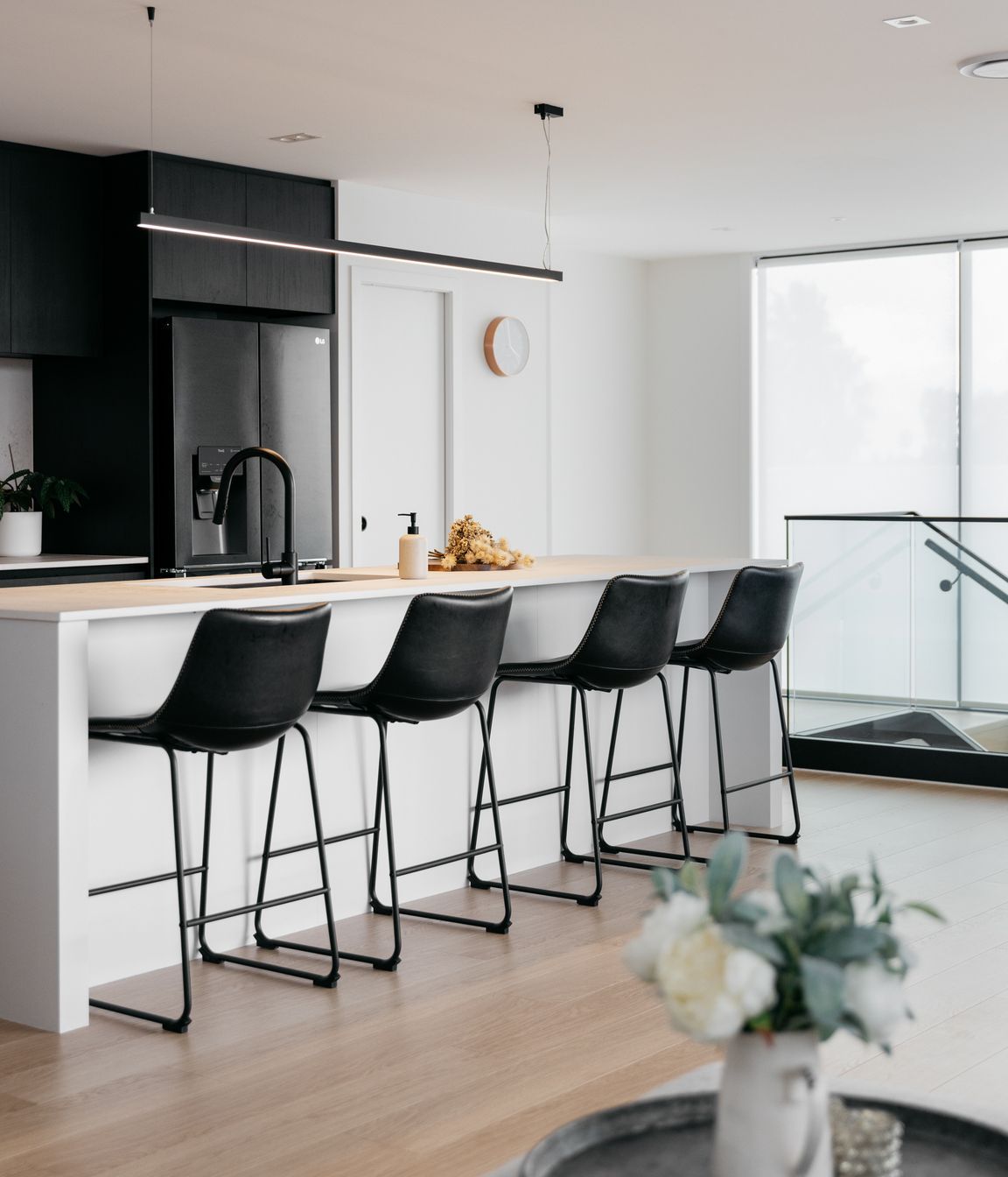 The large island bench provides room for additional seating.