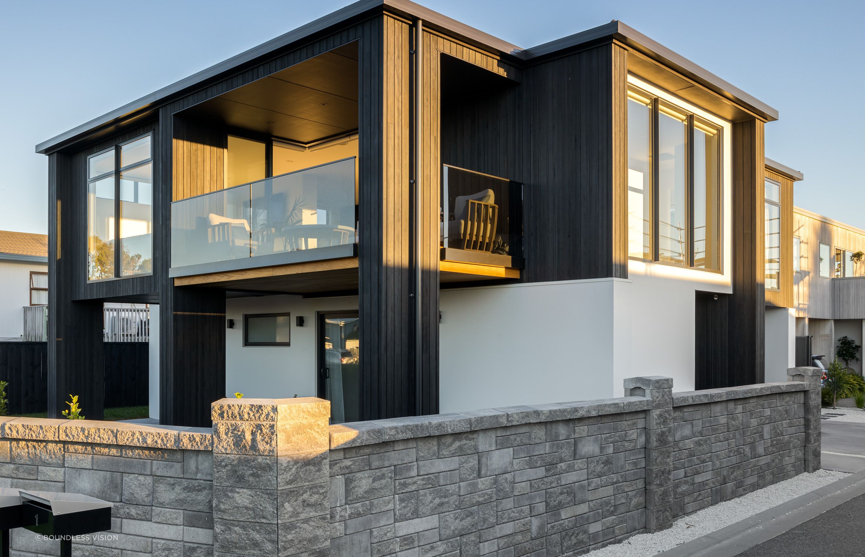The two-storey home is part of a new coastal development by Flowerday Homes in Bay of Plenty.