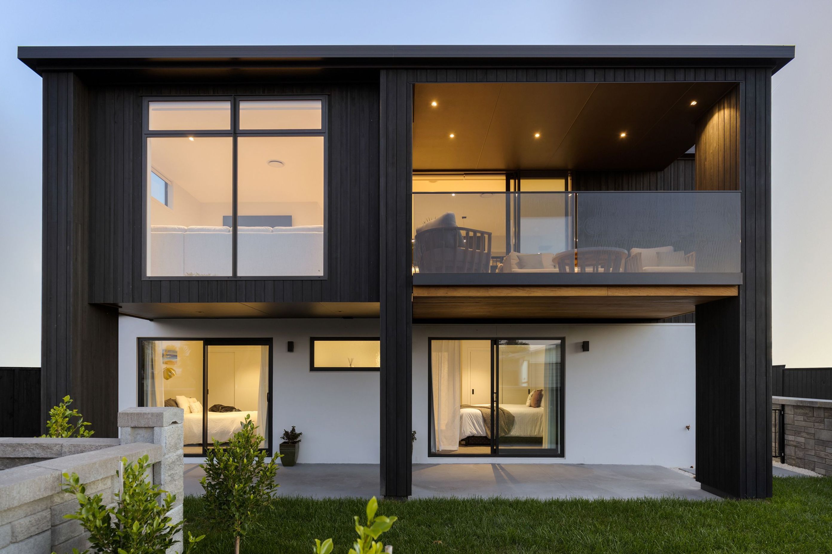 Outdoor areas are easily accessible from both levels of the home.