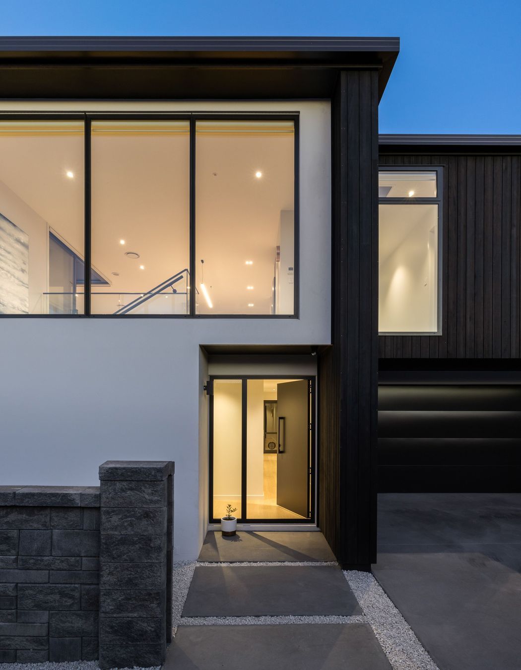 A coastal aesthetic continues from the exterior to the interior.