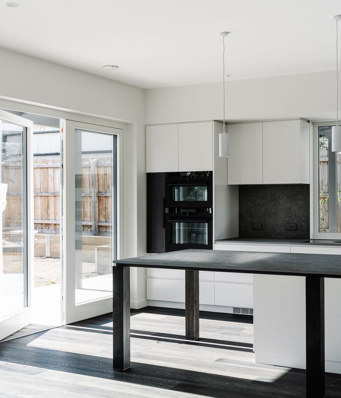 10-portrait-envirotecture-wrighty-tighty-haus-vic-kitchen.jpg