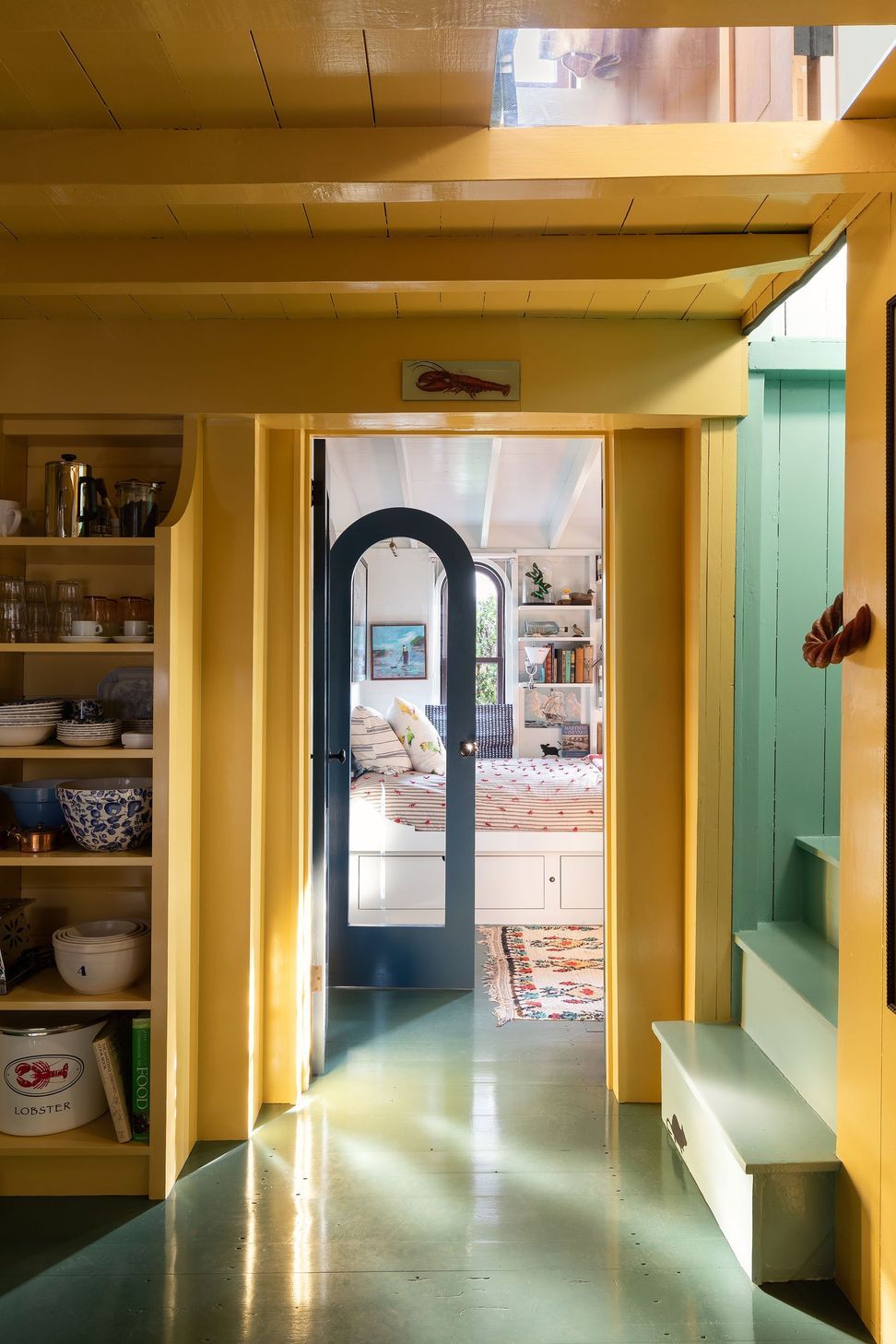 10MarthasVineyardCottageCuppettKilpatrickArchitectureandInteriorDesignyellow-green-hallway-view-to-bedroom.jpg