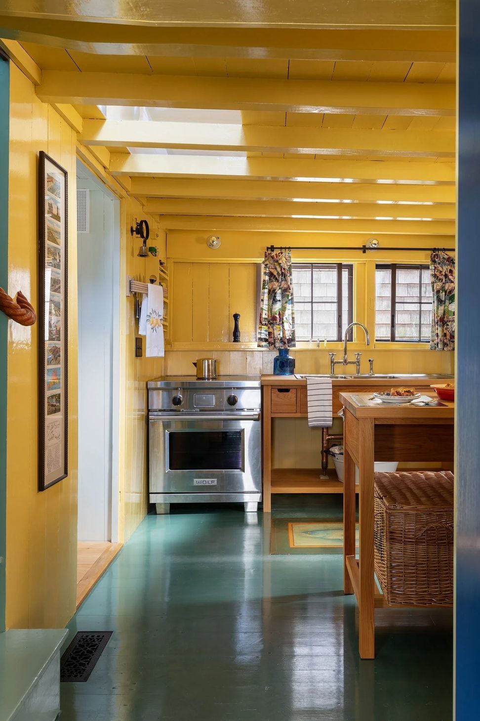 12MarthasVineyardCottageCuppettKilpatrickArchitectureandInteriorDesignyellow-kitchen-stainless-appliances-green-floor-ap-compressed.jpg