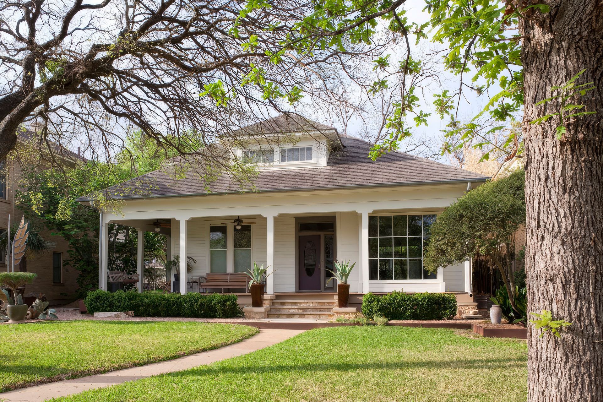 13BackAlleyCuppettKilpatrickArchitectureandInteriorDesignaustin-tx-mainhouse-traditional-architecture-front-porch-upscaled-by-Replicate.jpg