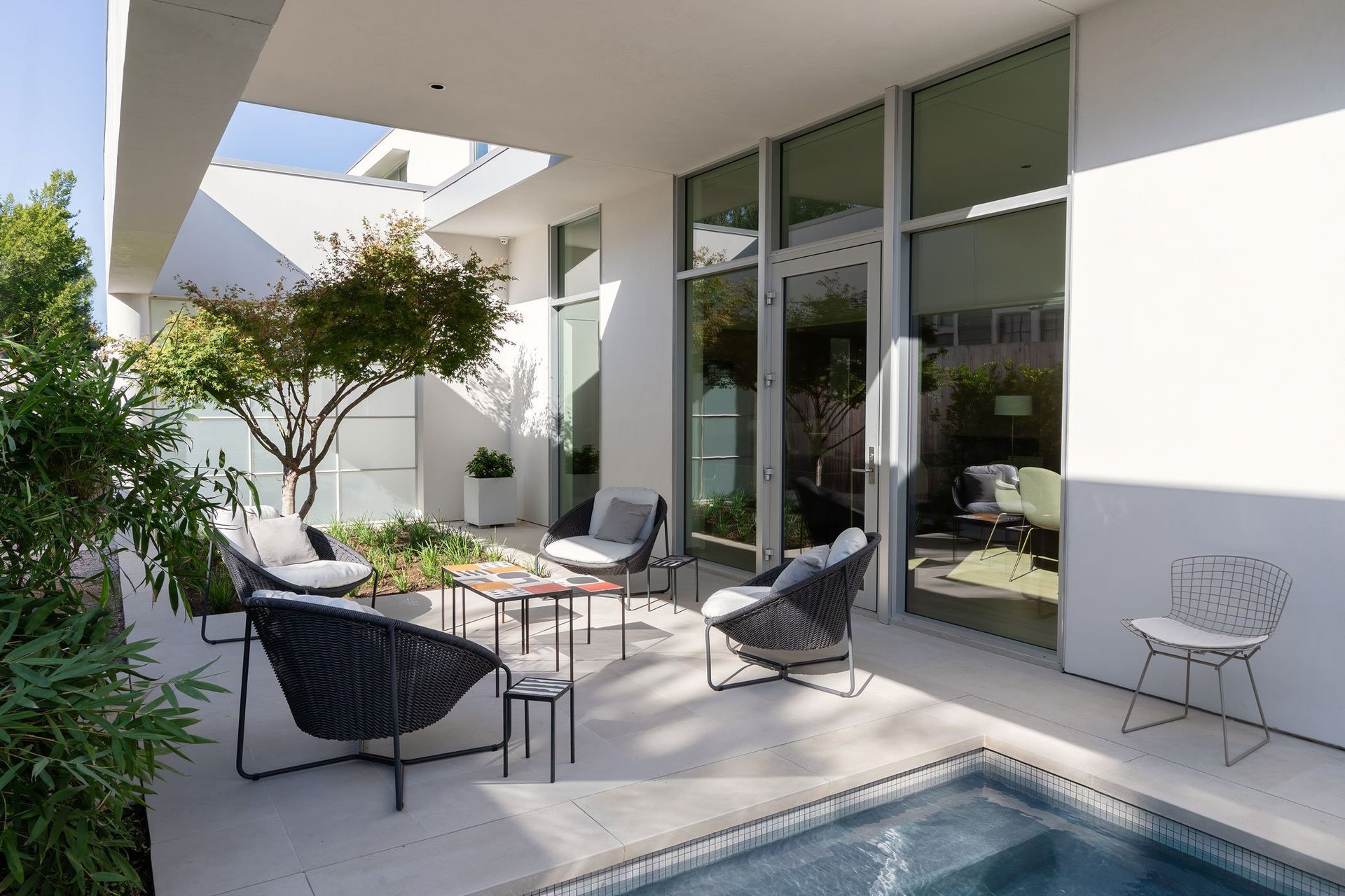 14WethersfieldTownhouseCuppettKilpatrickArchitectureandInteriorDesignaustin-home-outdoor-patio-modern-seating-plunge-pool.jpg