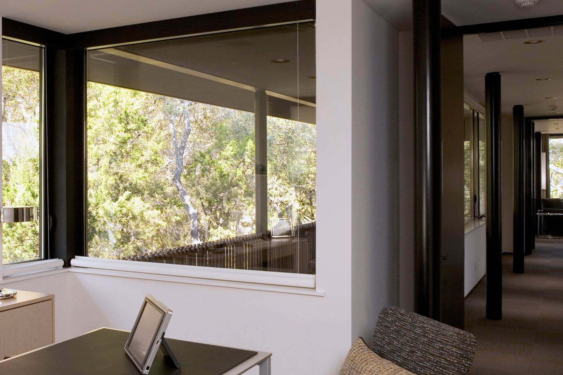 15HouseinTreesCuppettKilpatrickArchitectureandInteriorDesignaustin-tx-modern-office-space-natural-view-2.jpg