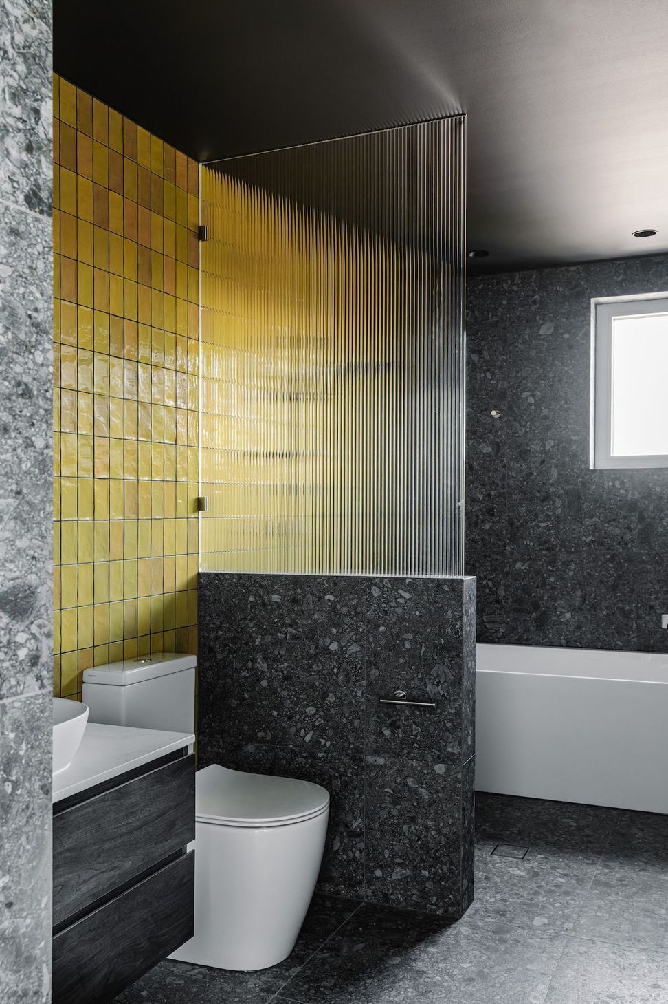 16-portrait-envirotecture-wrighty-tighty-haus-vic-yellow-bathroom.jpg