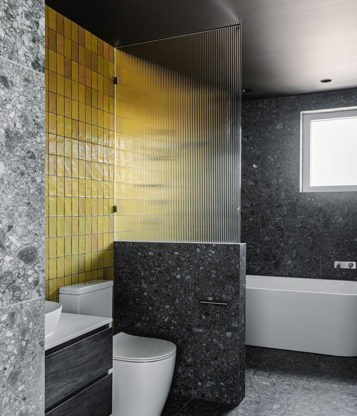16-portrait-envirotecture-wrighty-tighty-haus-vic-yellow-bathroom.jpg