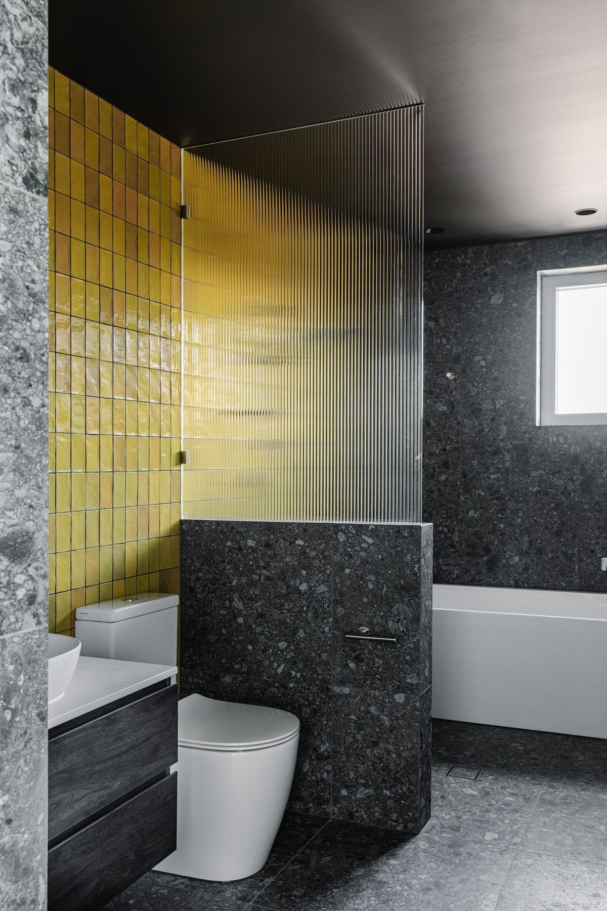 16-portrait-envirotecture-wrighty-tighty-haus-vic-yellow-bathroom.jpg