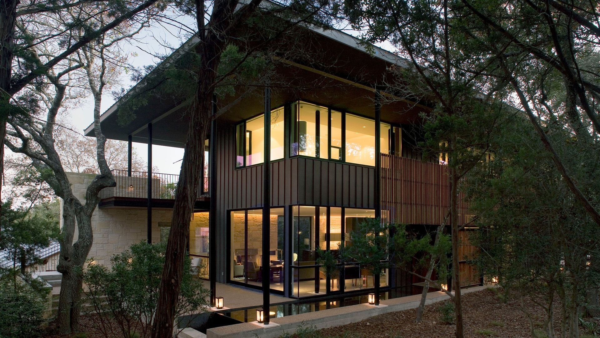 House in Trees banner