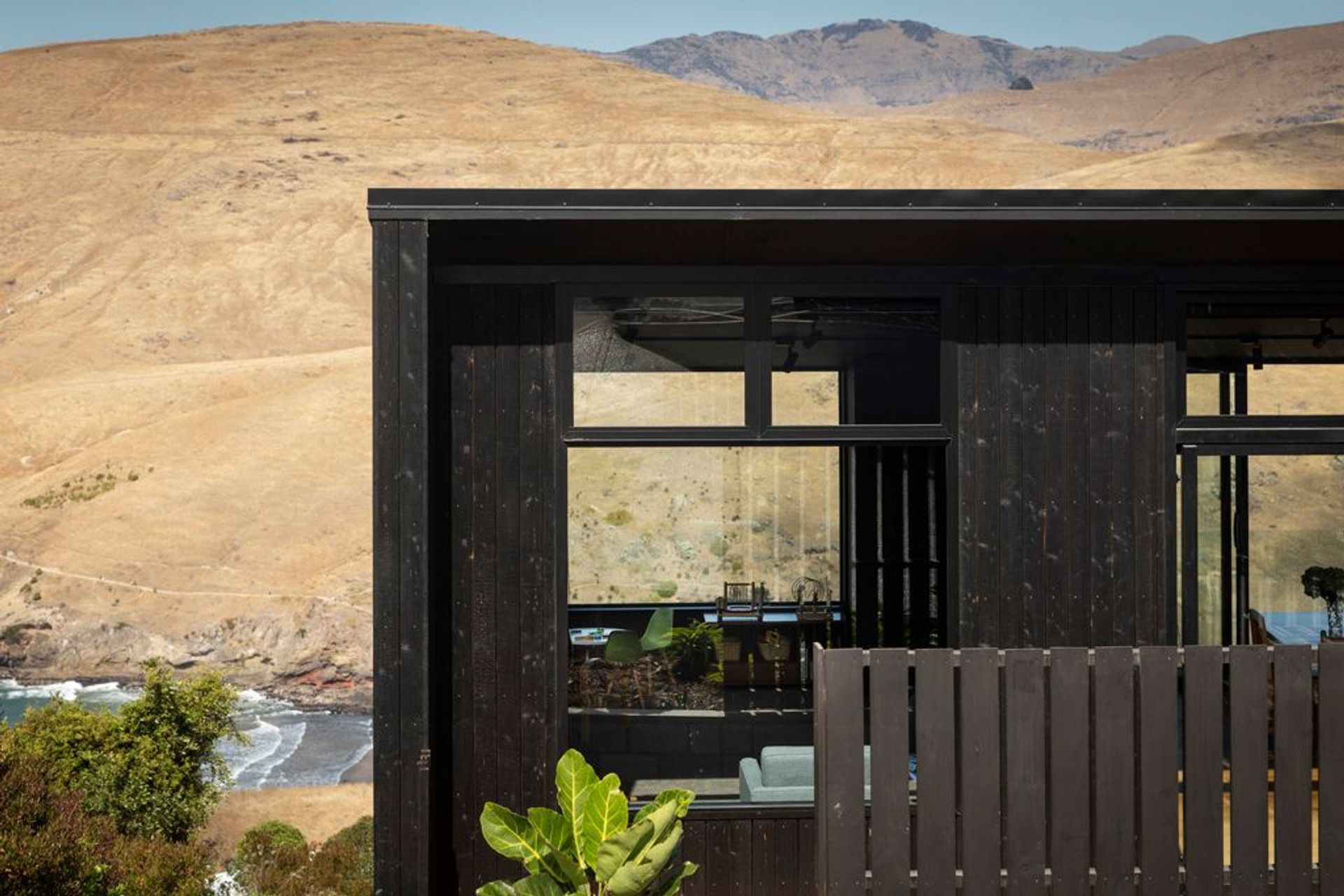 An exterior of charred larch cladding helps minimise the need for ongoing maintenance.