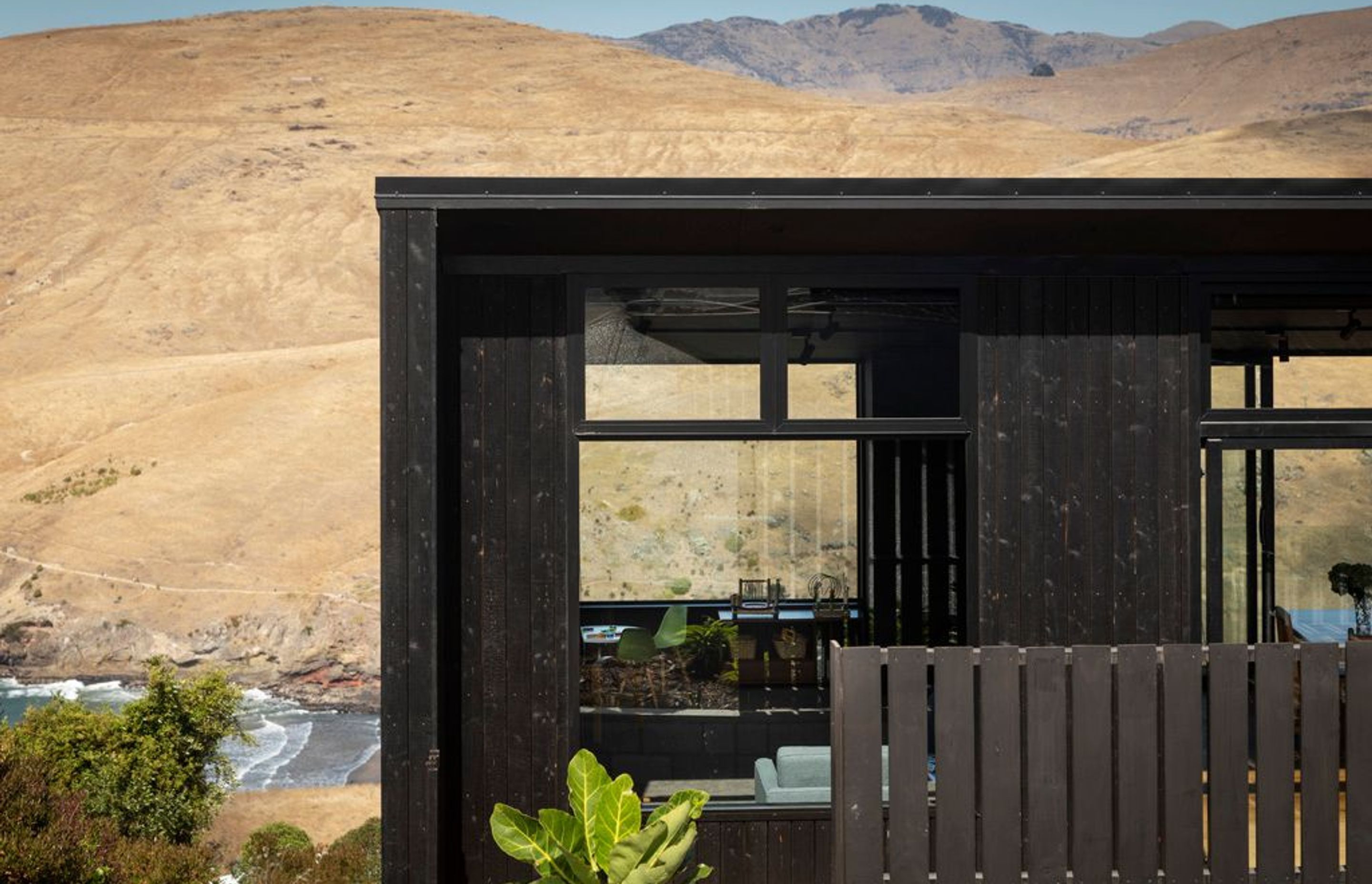 An exterior of charred larch cladding helps minimise the need for ongoing maintenance.