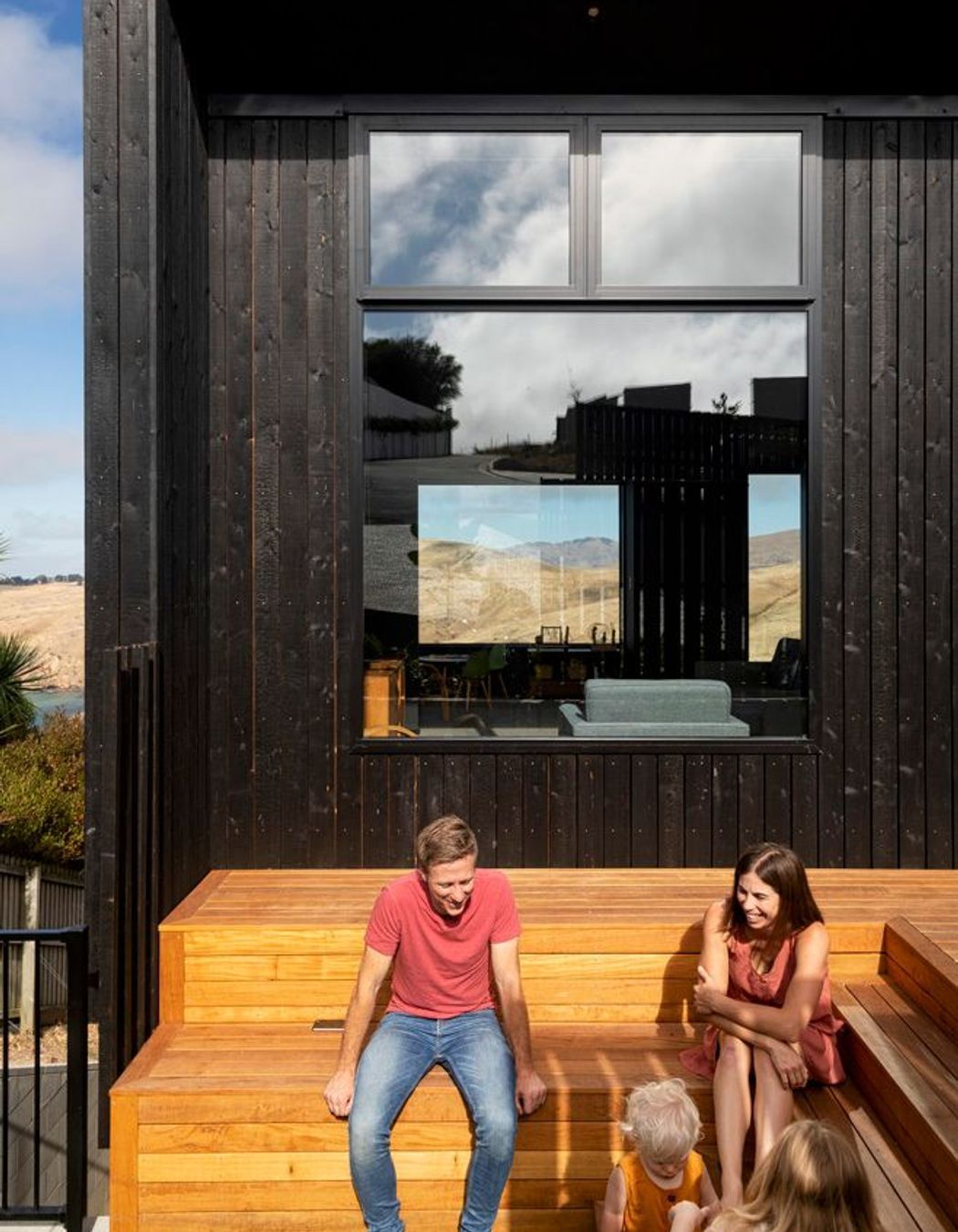 An intimate outdoor area allows the family to make the most of the afternoon sun.