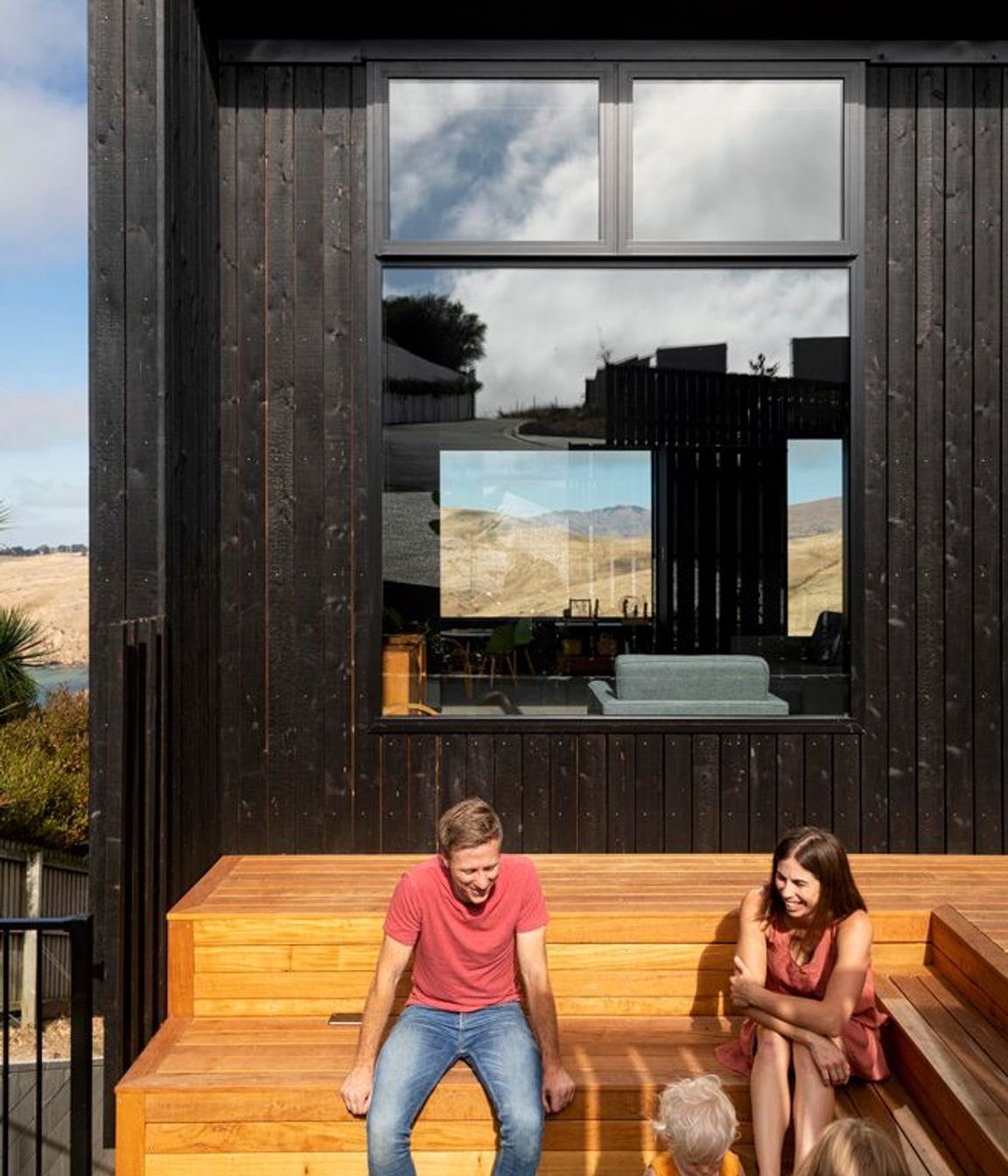 An intimate outdoor area allows the family to make the most of the afternoon sun.