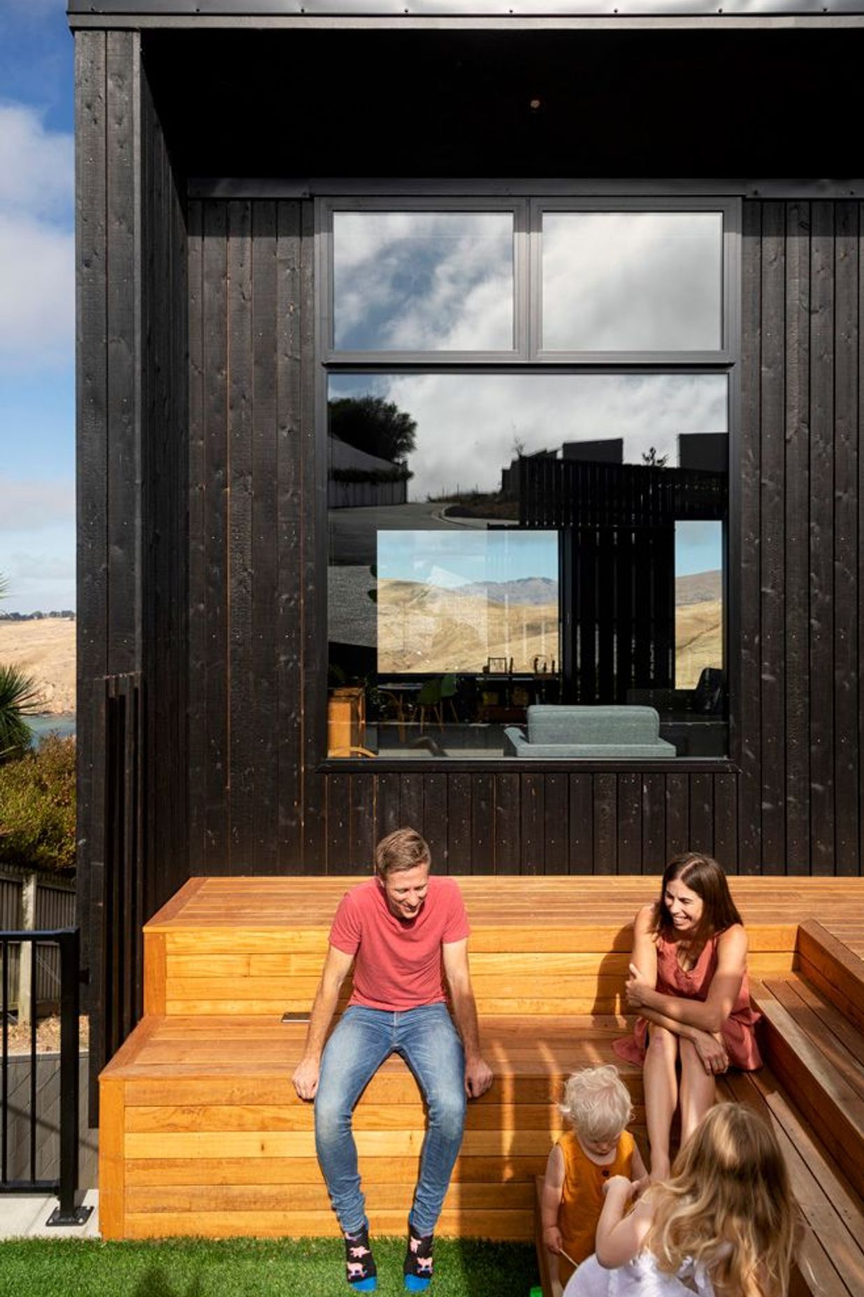 An intimate outdoor area allows the family to make the most of the afternoon sun.