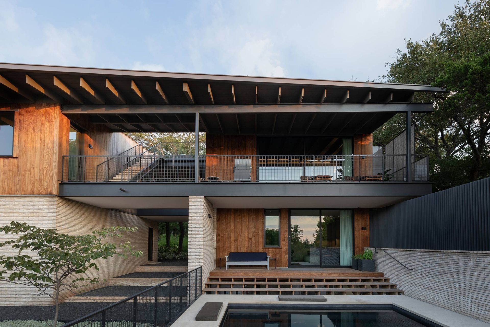 1WoodlandRetreatCuppettKilpatrickArchitectureandInteriorDesignsteel-wood-house-pool-architecture-1.jpg