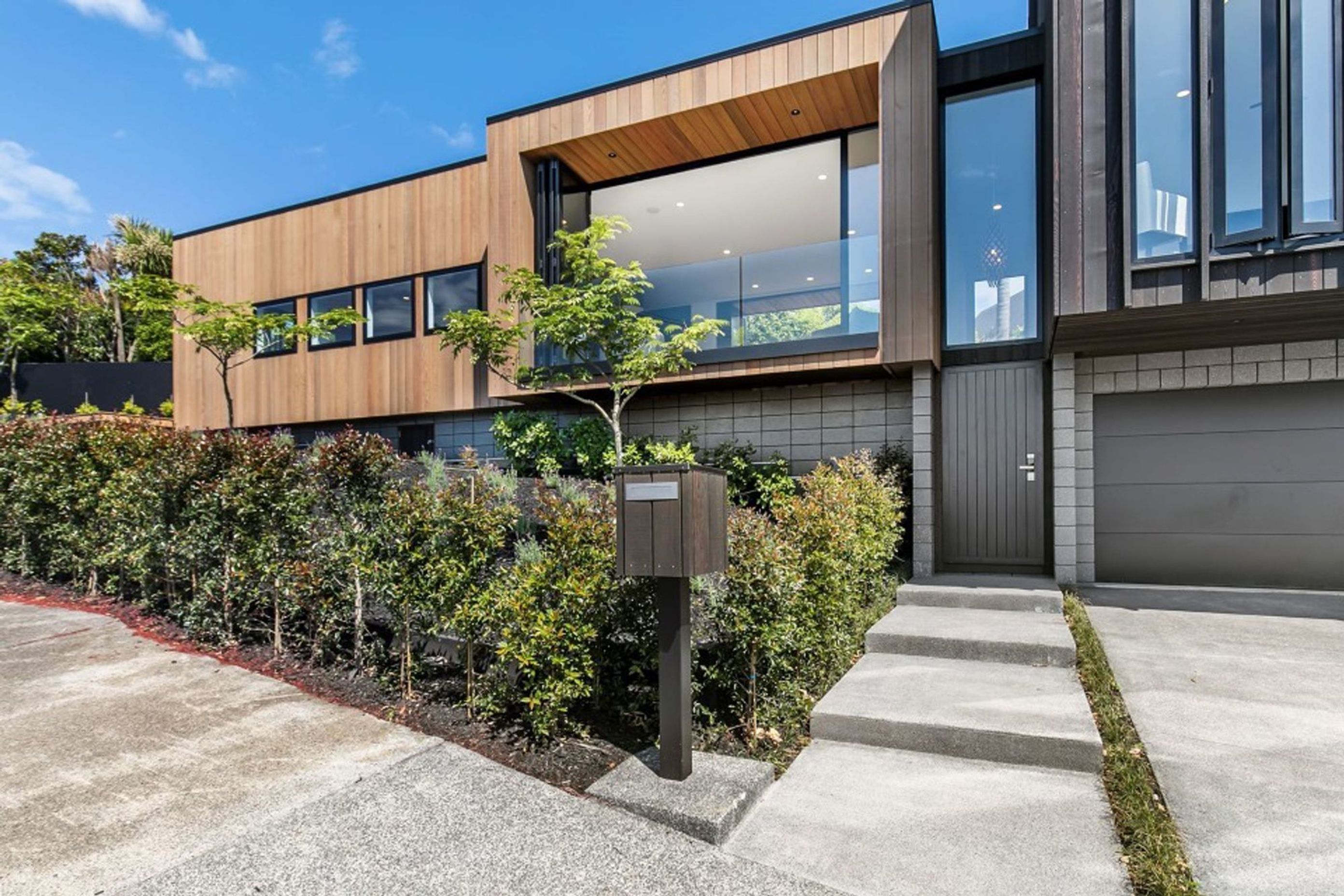 Much of the original site was levelled to make way for new foundations to accommodate the three-storey "tower" volume, with the single-level living volume set at a mid-floor elevation.