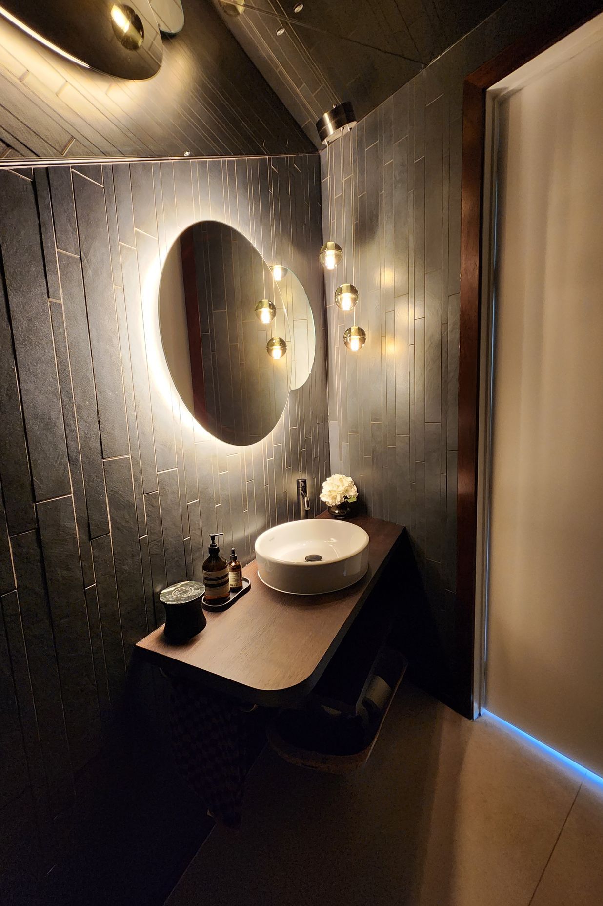 3-Powder-Room-designed-by-Aveora-Products-used-Switch-Lighting-Lutron-Electronics-automated-lighting-Bocchi-pendant-from-ECC.jpg
