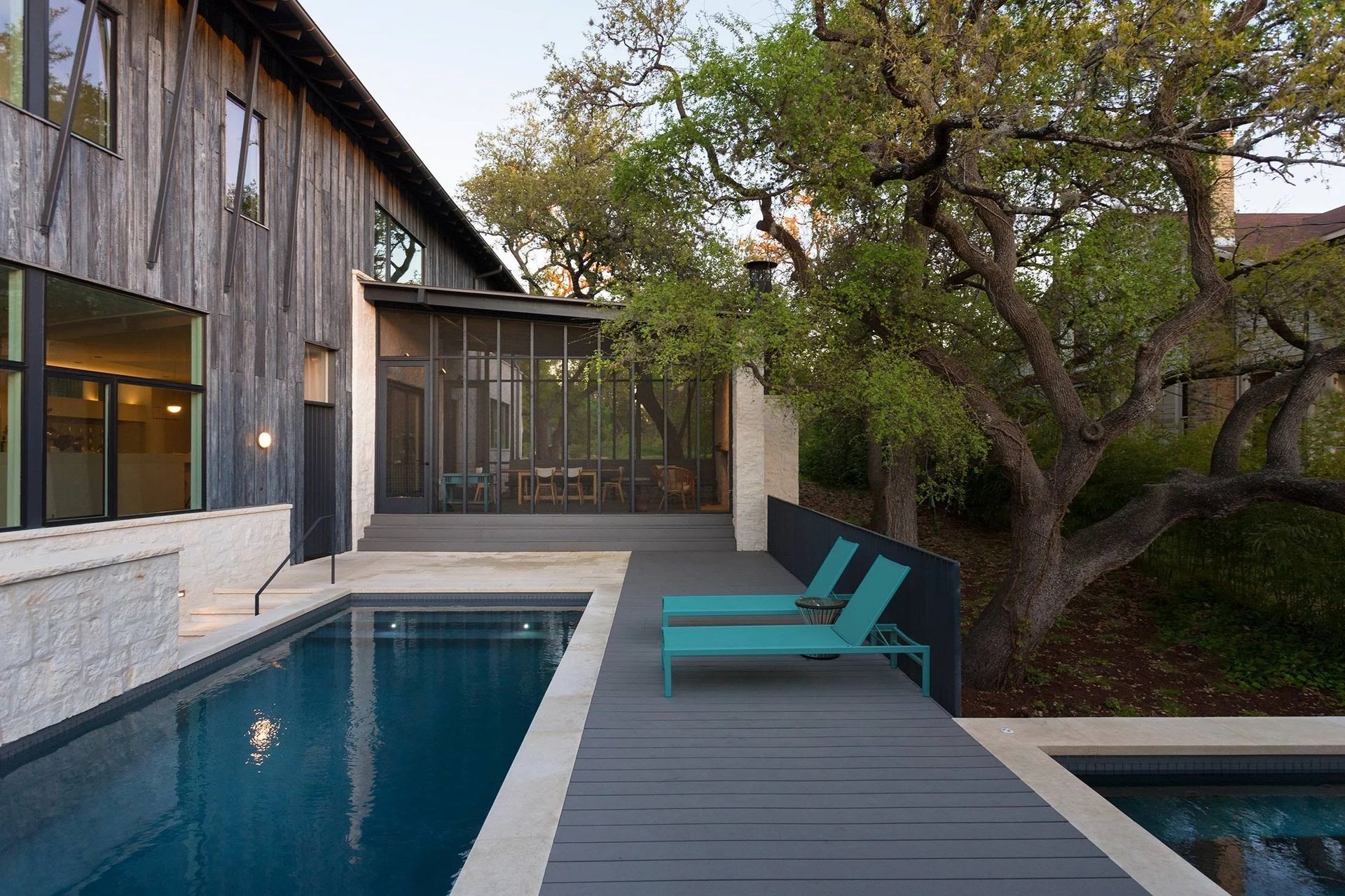 3HillsideCuppettKilpatrickArchitectureandInteriorDesignaustin-tx-contemporary-pool-deck-wood-siding-ap-compressed.jpg