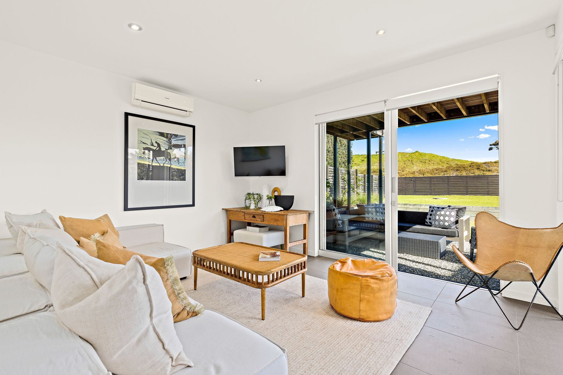 The Downstairs Studio or Living for Guests enjoys excellent afternoon light. Photo Credit:Amy Jenkins/Glasshouse Photography