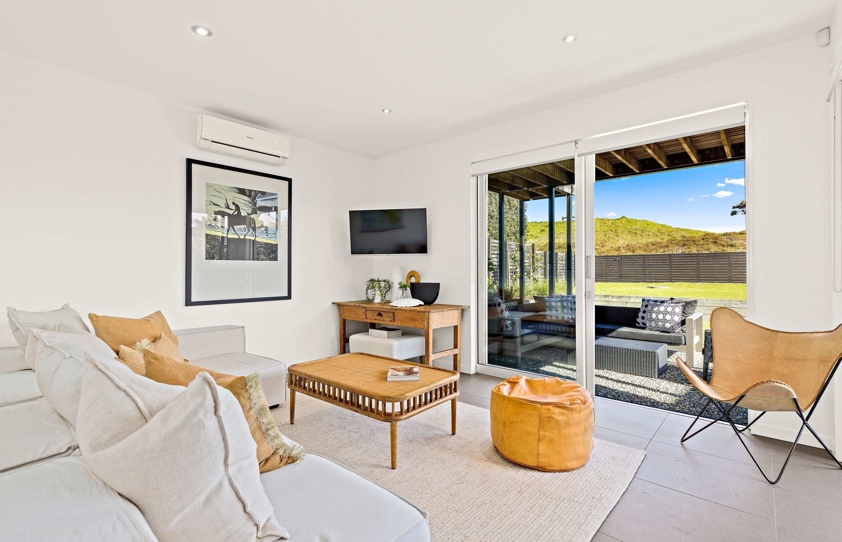 The Downstairs Studio or Living for Guests enjoys excellent afternoon light. Photo Credit:Amy Jenkins/Glasshouse Photography