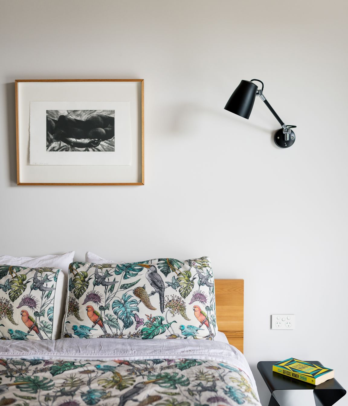 The house has four bedrooms, two bathrooms and a powder room. The walls are painted in Resene Snowdrift, which is offset by all steel being painted in Resene Nero.