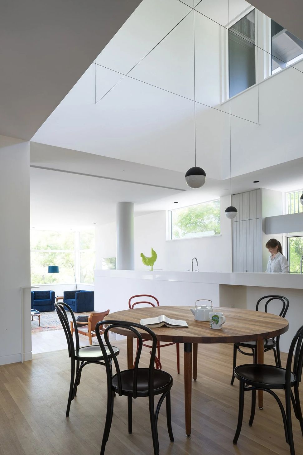 7HillsideCuppettKilpatrickArchitectureandInteriorDesignaustin-tx-kitchen-dining-geometric-light-fixture-interior-design-ap-compressed.jpg