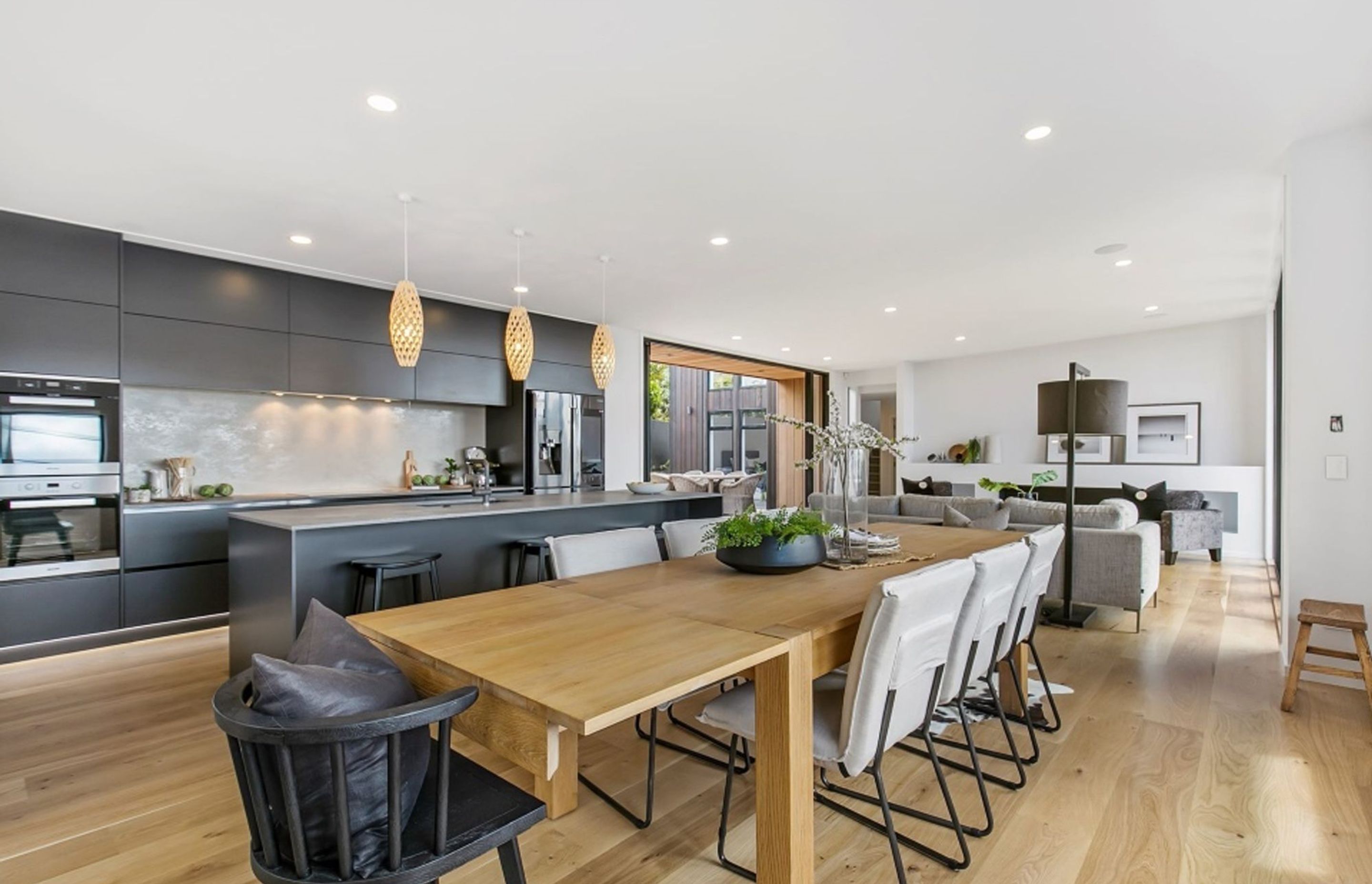 Front and rear decks lead off the living area to a north-facing balcony and sheltered courtyard, respectively. Access to the 'tower' volume is through a door are the end of the room.