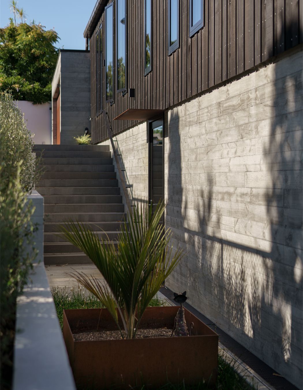 The house was positioned so a driveway could fit down the side, in case of future development of the large site.